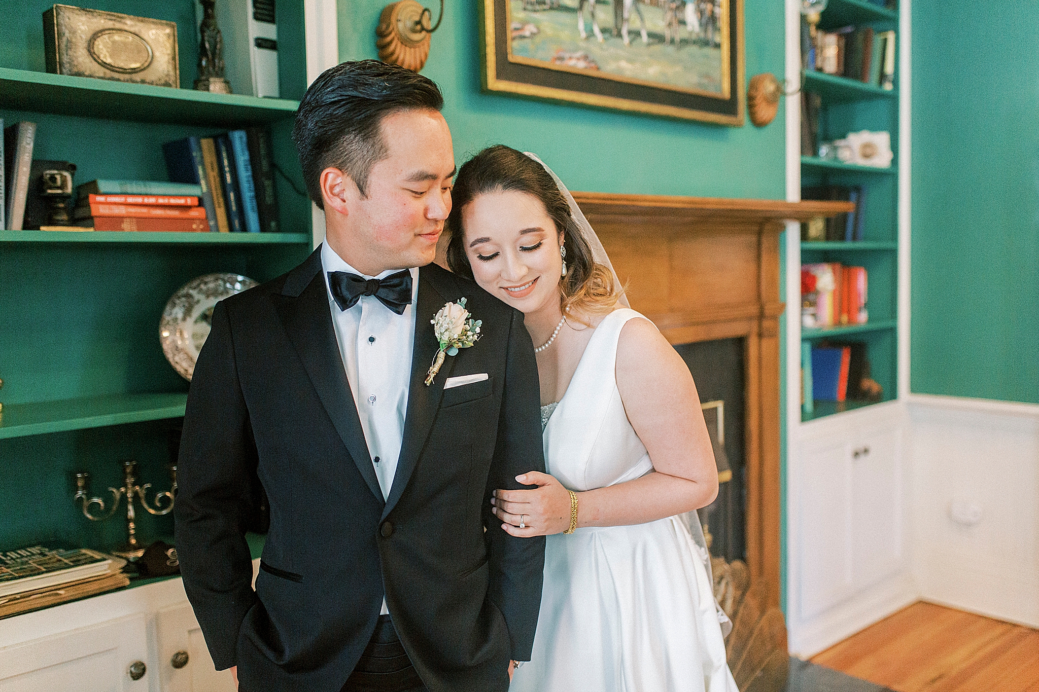 newlyweds pose together in green room of Green Park Inn
