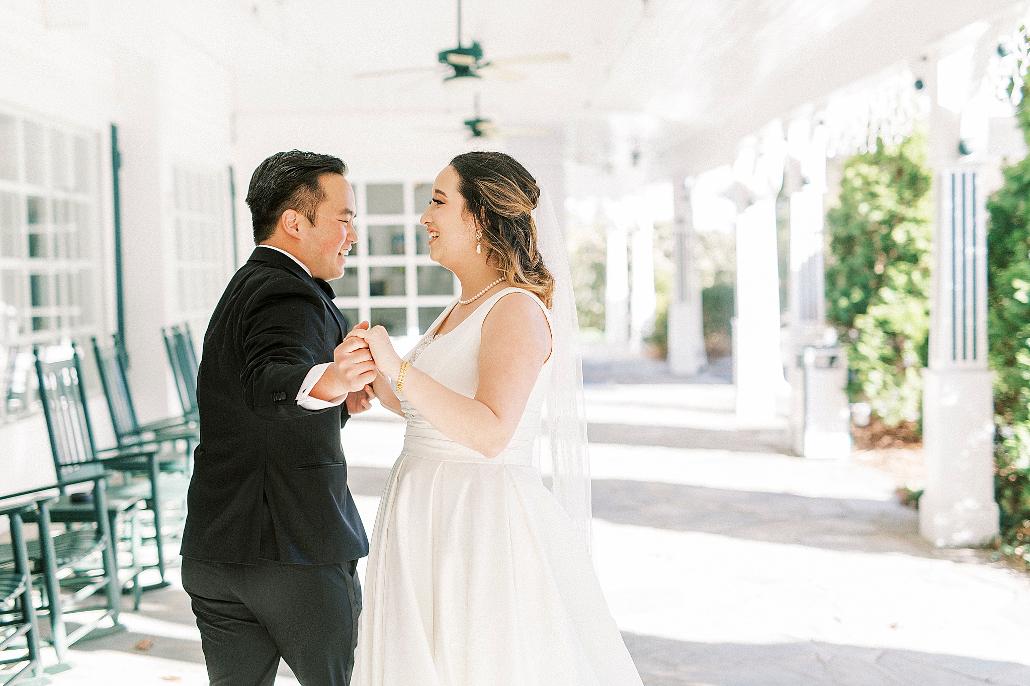 bride and groom dance in outdoor walkway at Green Park Inn