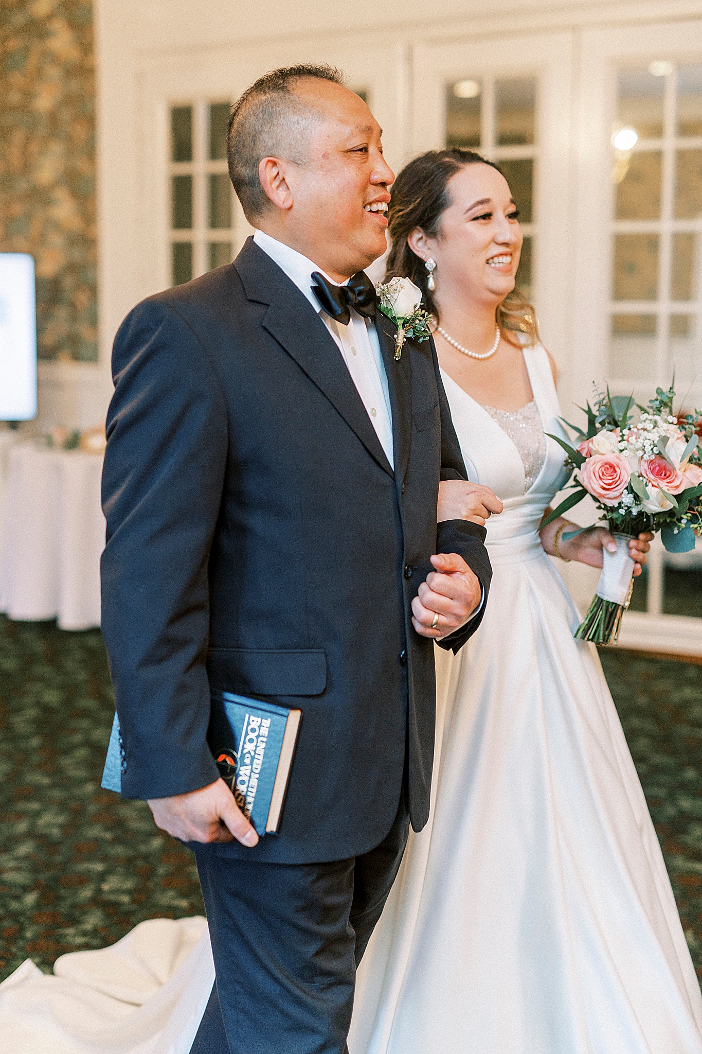 bride walks down the aisle during Green Park Inn wedding ceremony