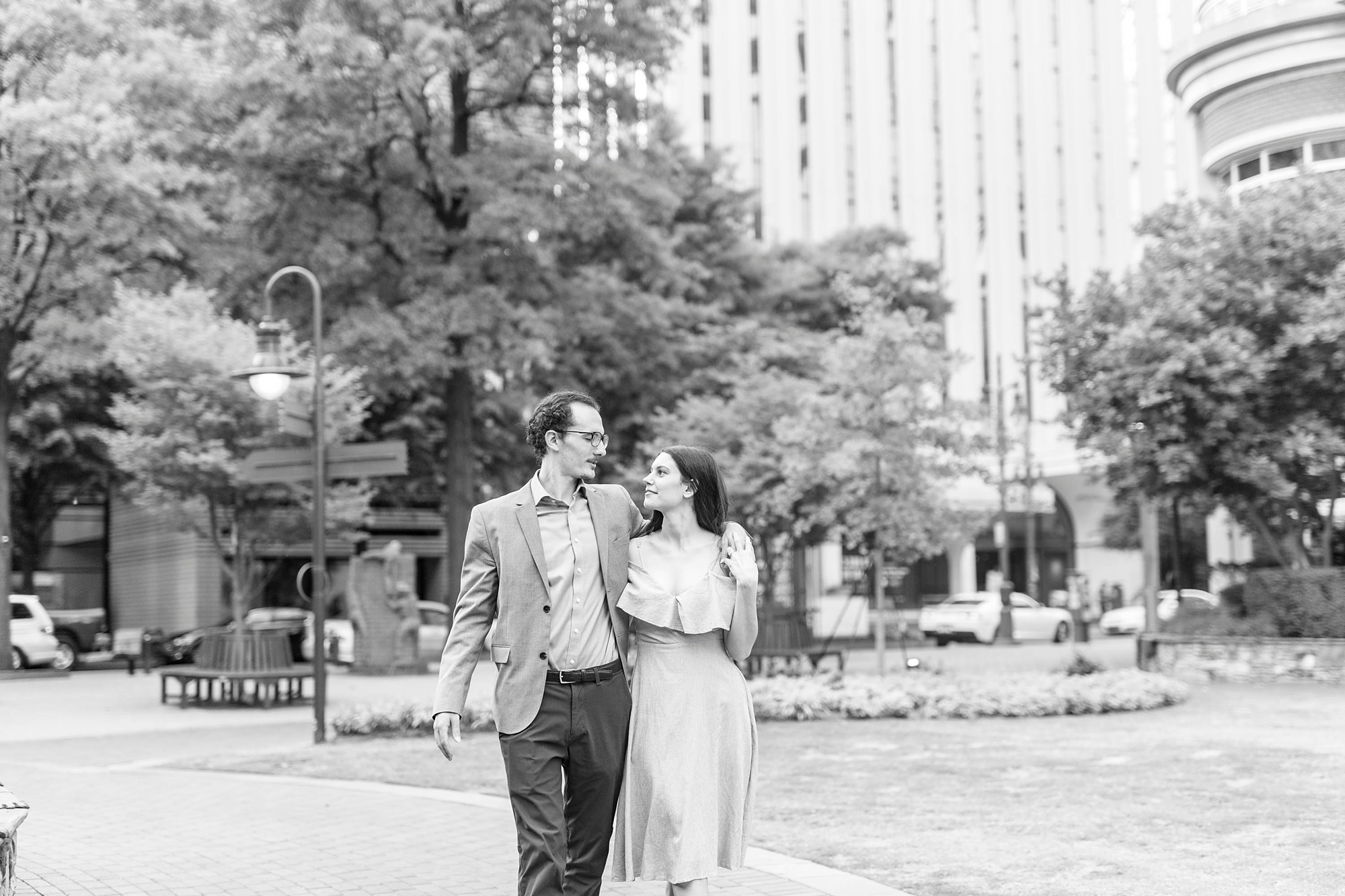bride and groom walk through The Green