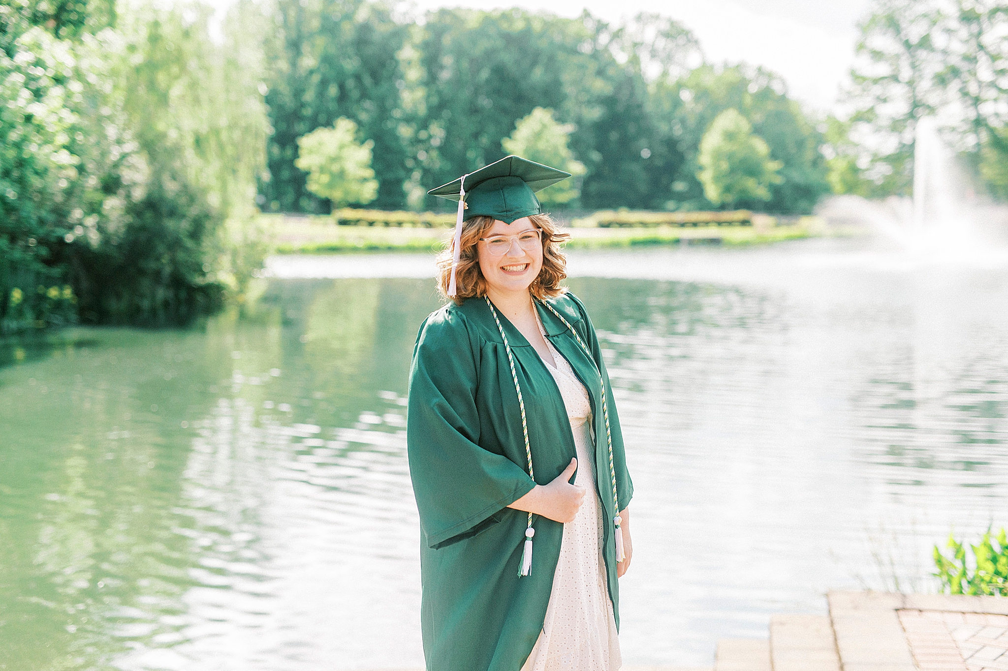 senior portraits by lake at UNCC