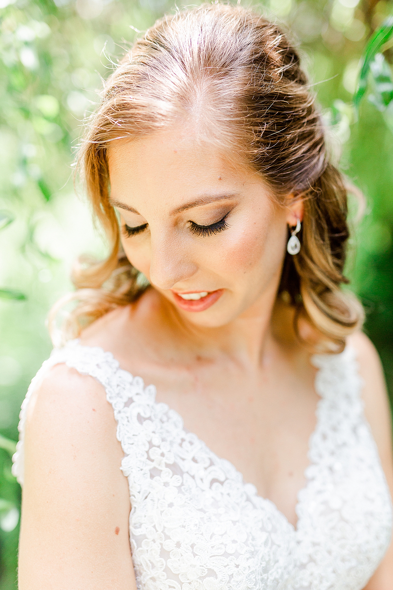 bride looks down during bridal session