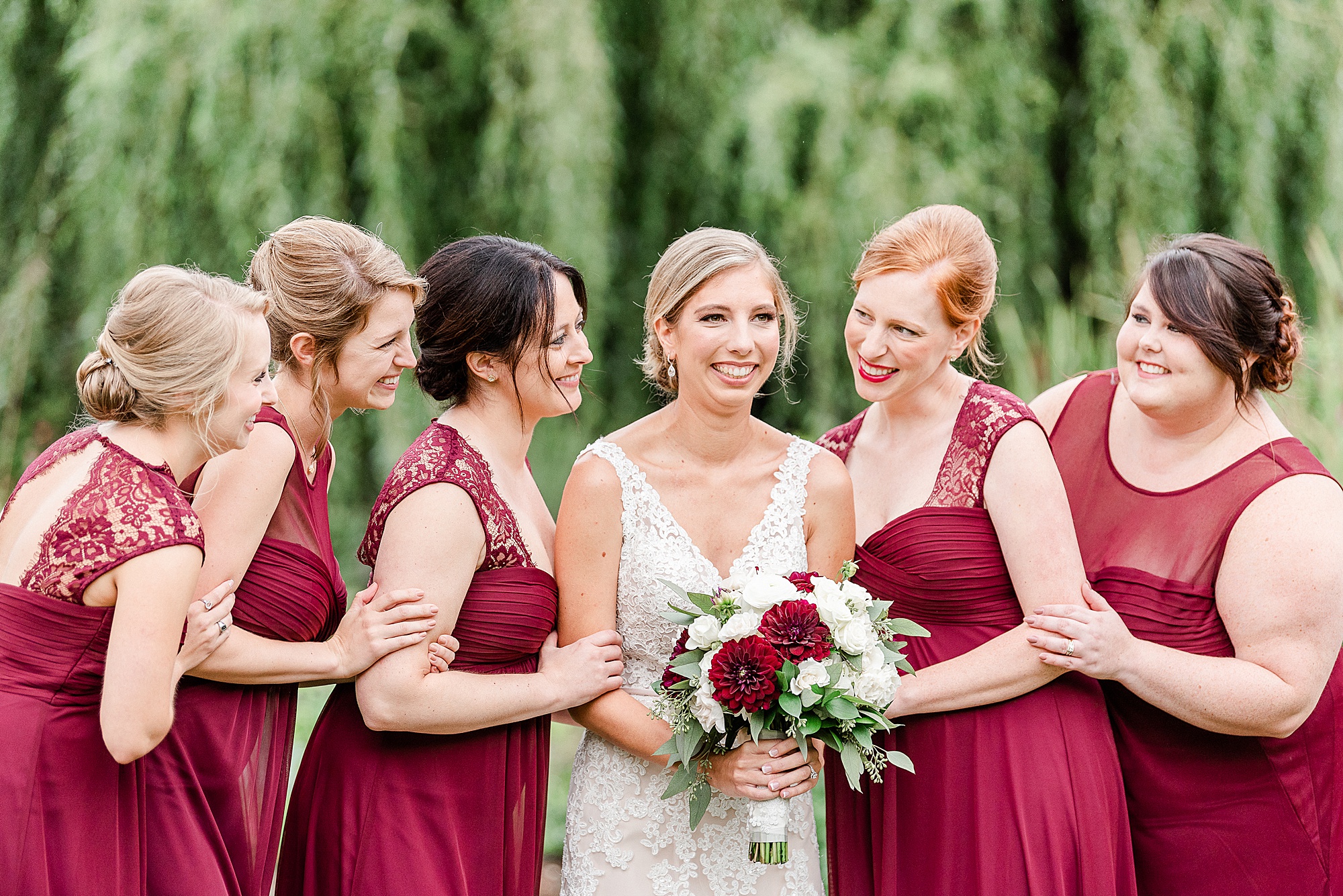 bridesmaids laugh with bride at Alexander Homestead