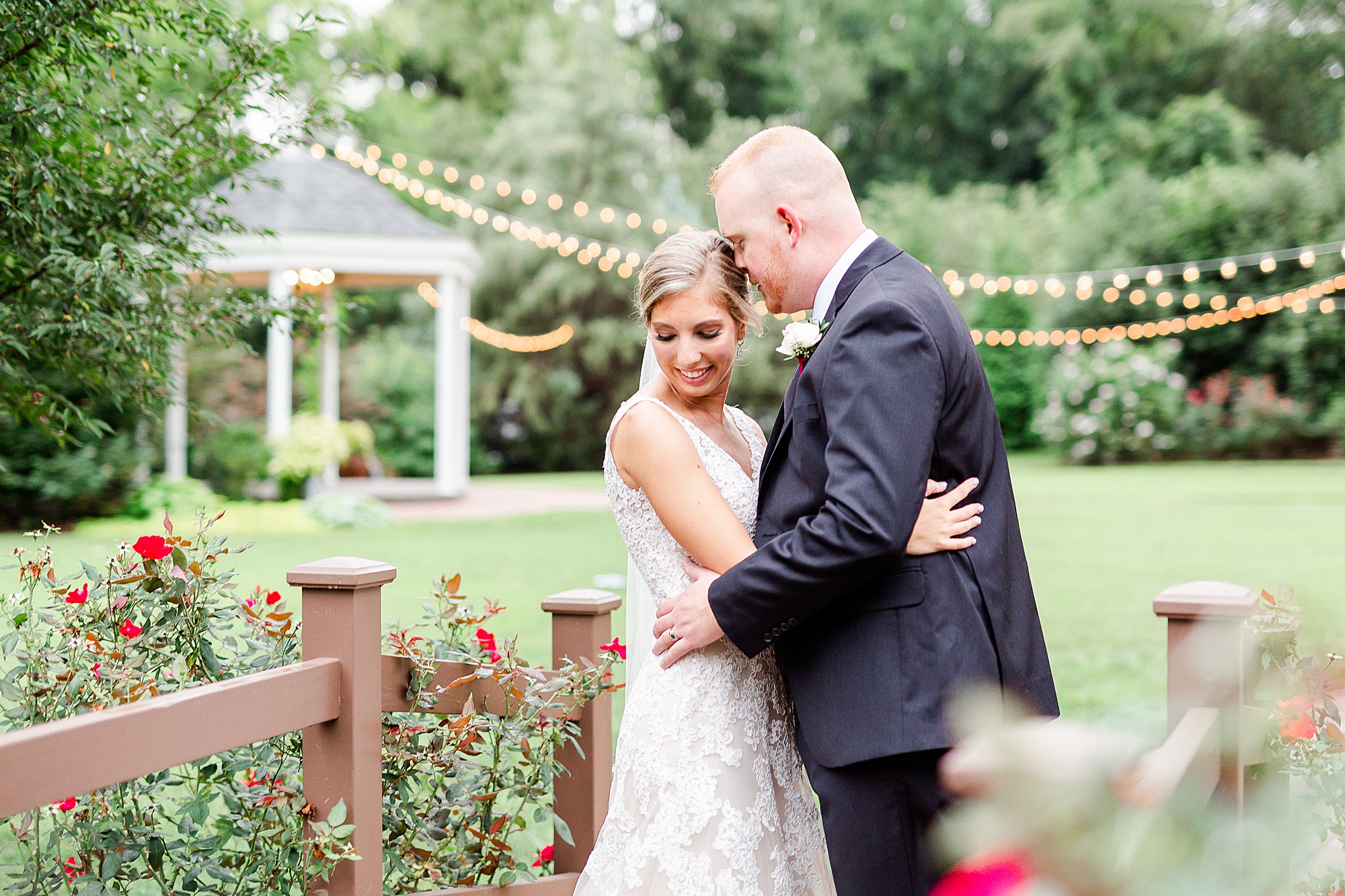 groom nuzzles bride's forehead at Alexander Homestead