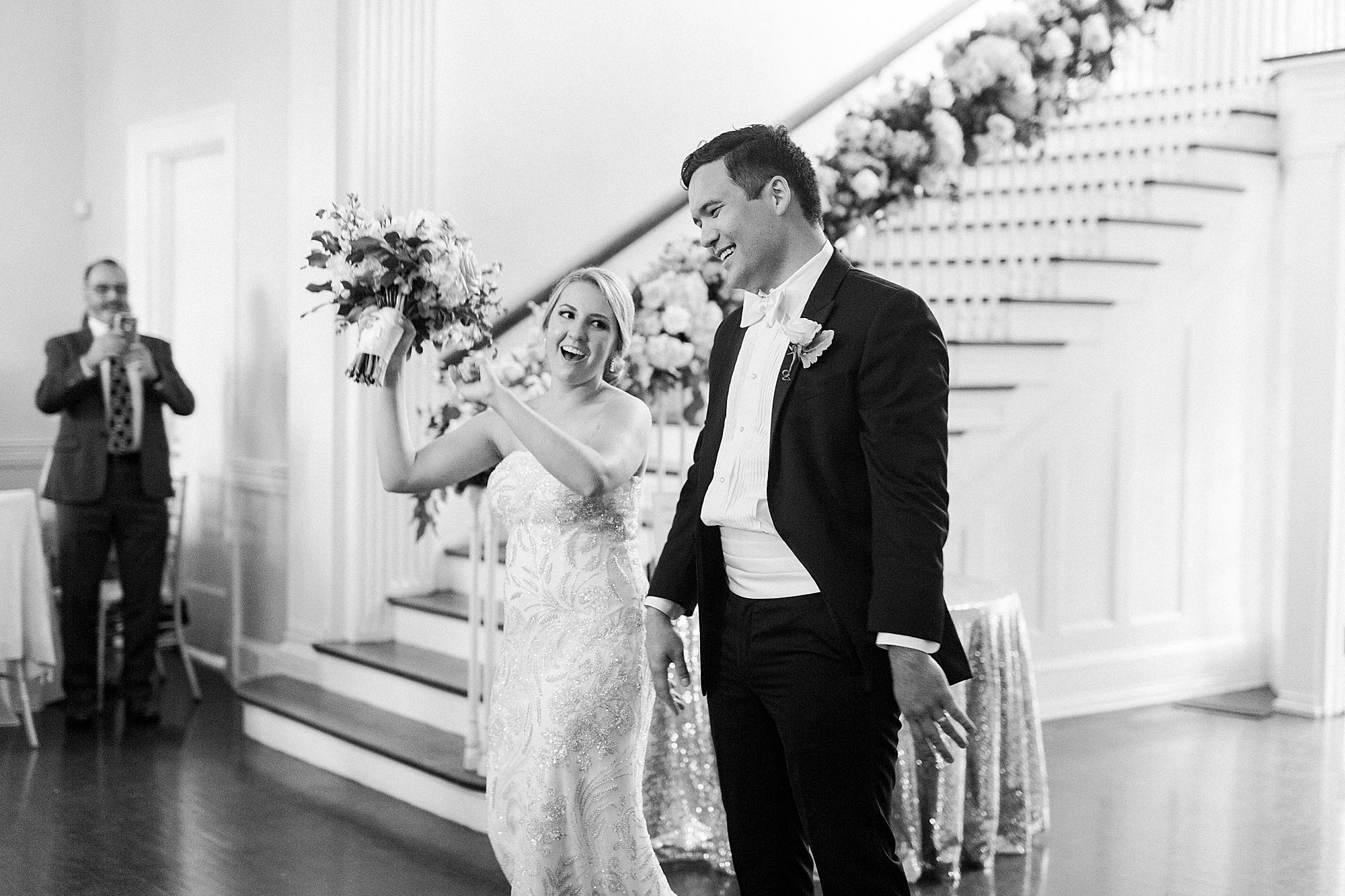 bride and groom enter wedding reception