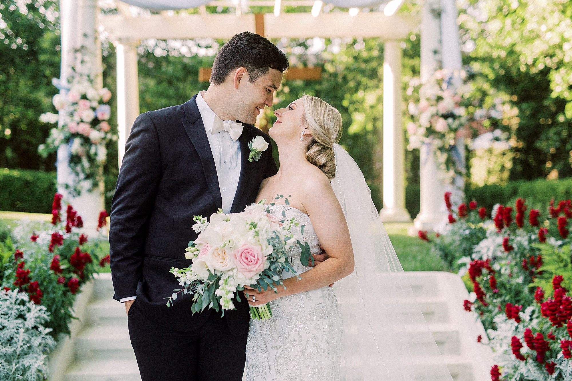 newlyweds laugh outside Separk Mansion