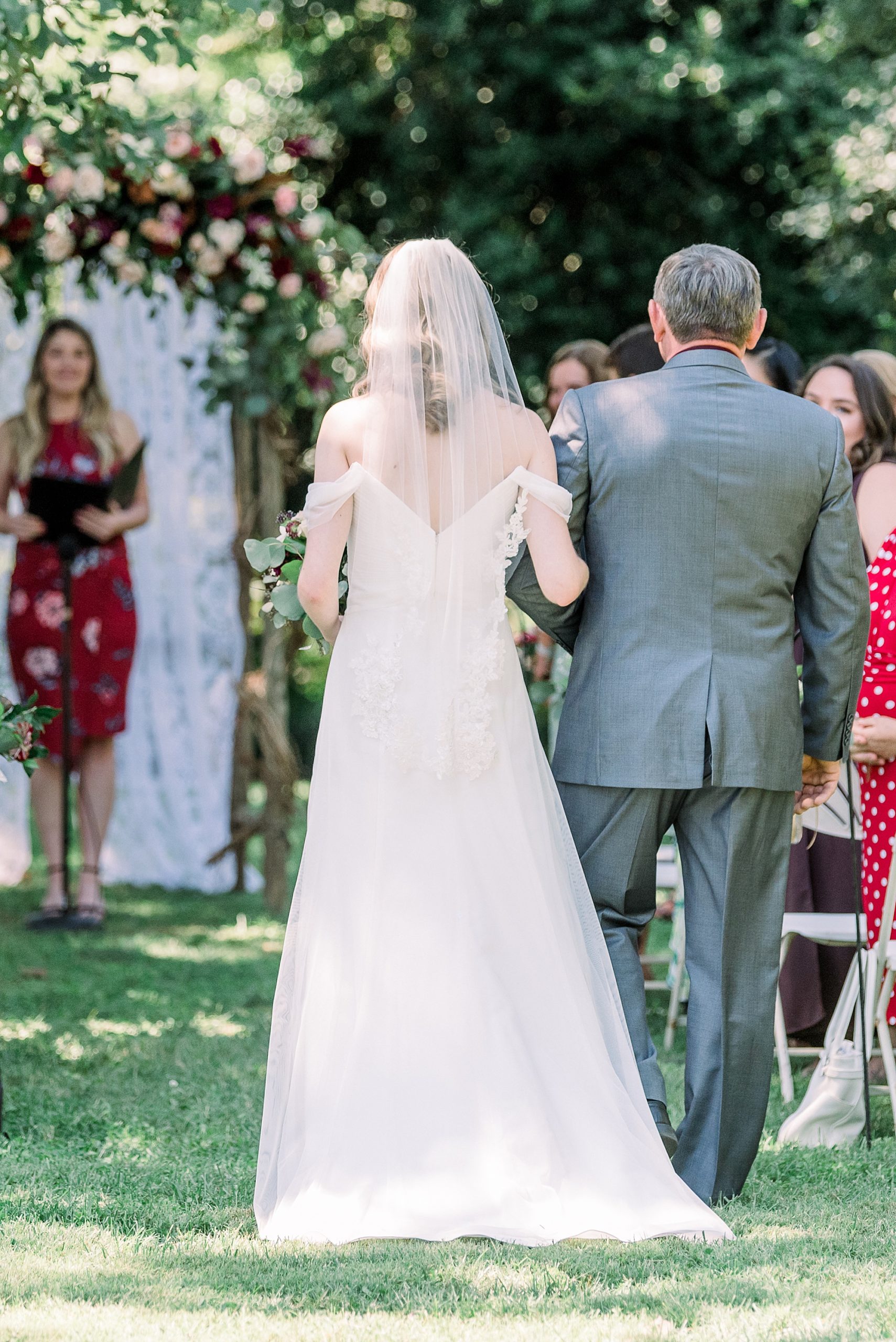 dad walks daughter down aisle at 1812 Hitching Post