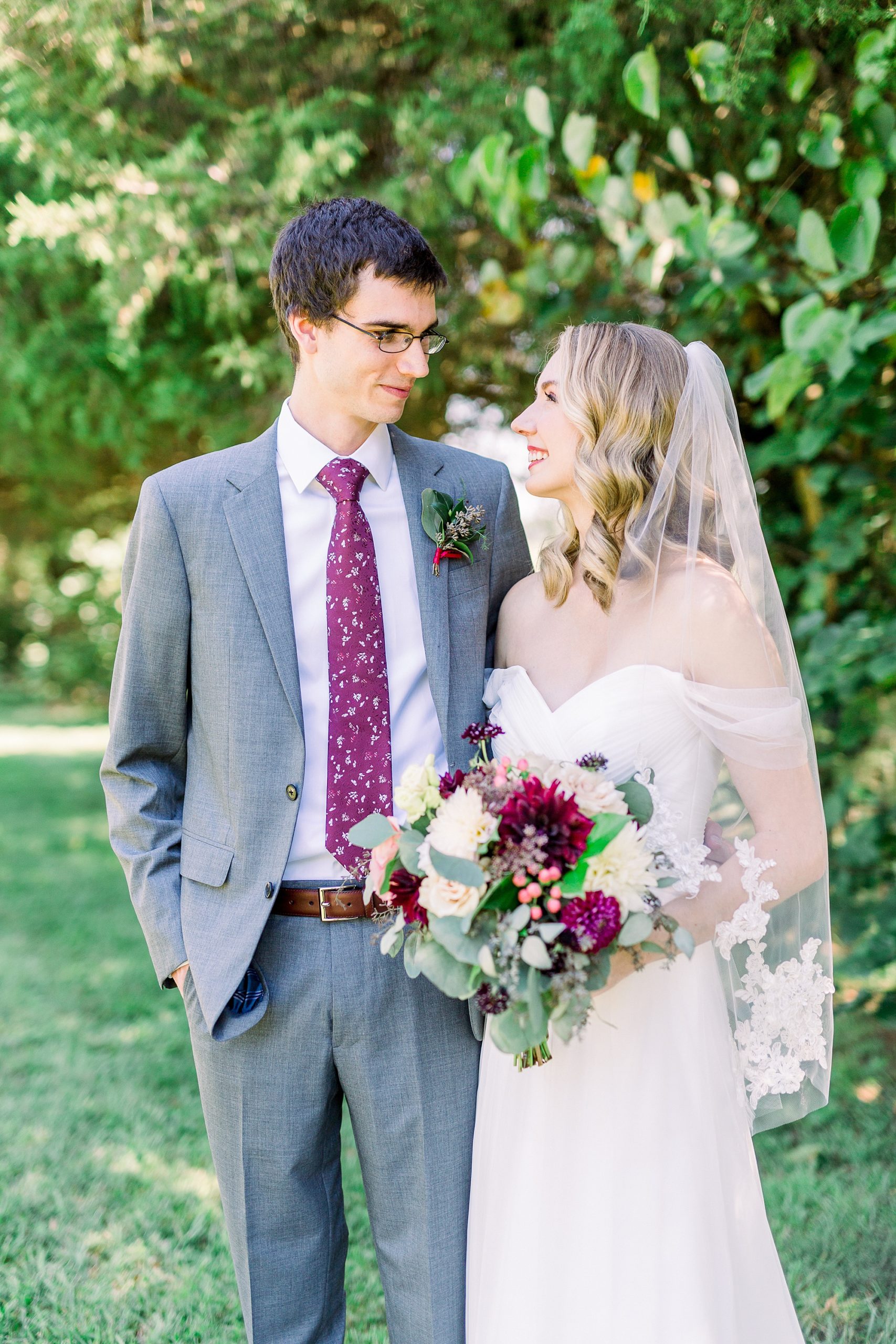 newlyweds pose together at 1812 Hitching Post