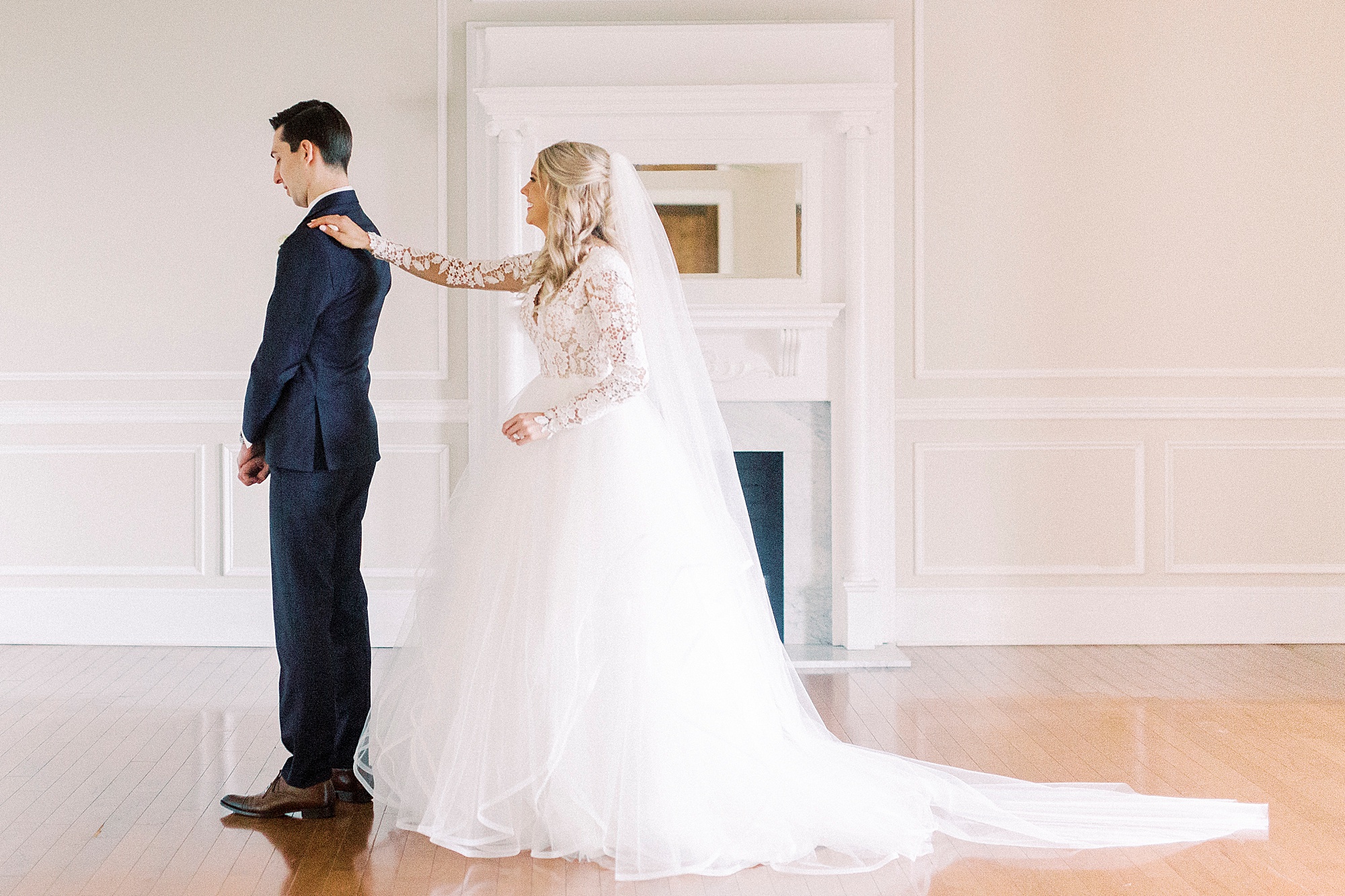 bride approaches groom for first look at Separk Mansion