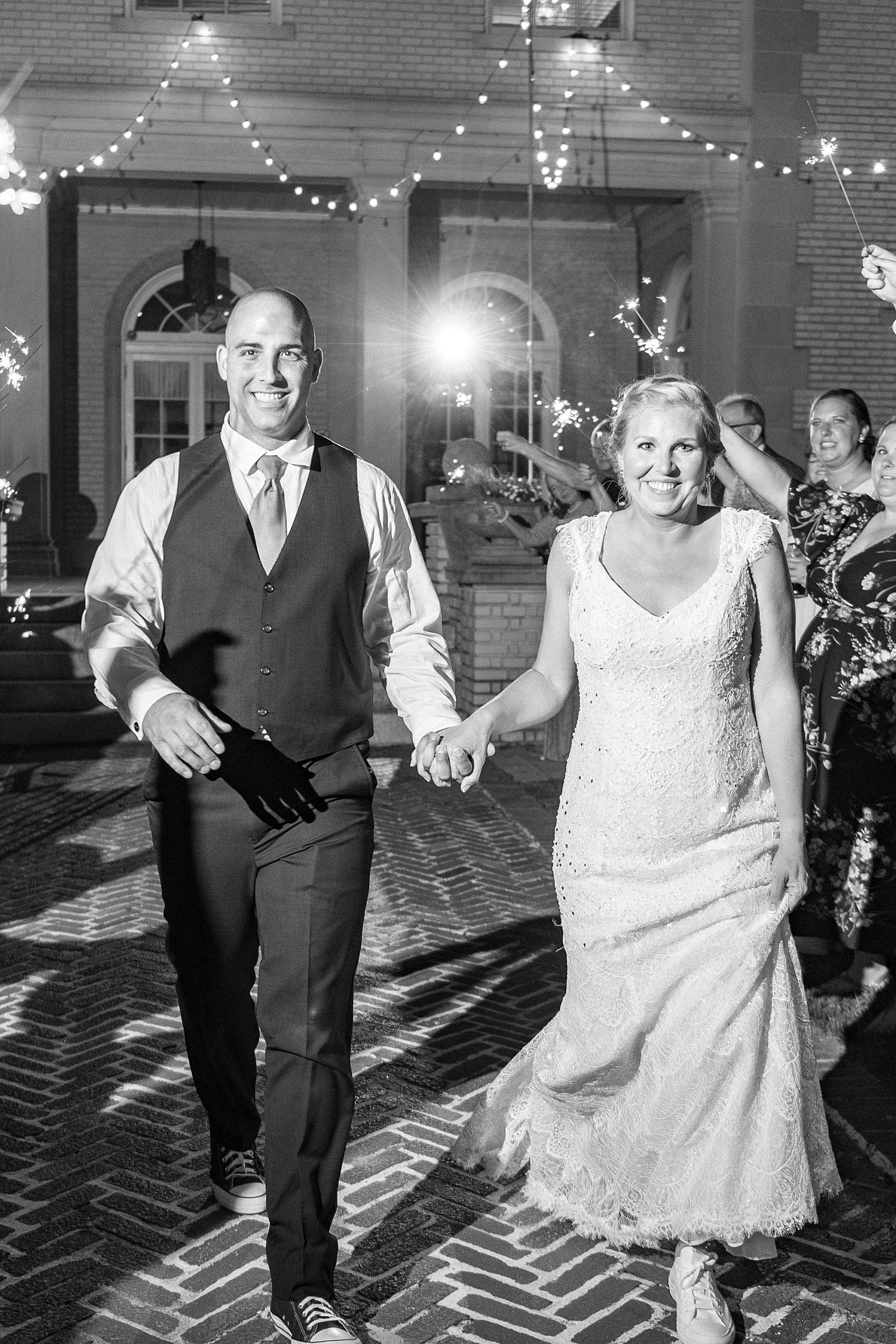 newlyweds leave during sparkler exit at Separk Mansion