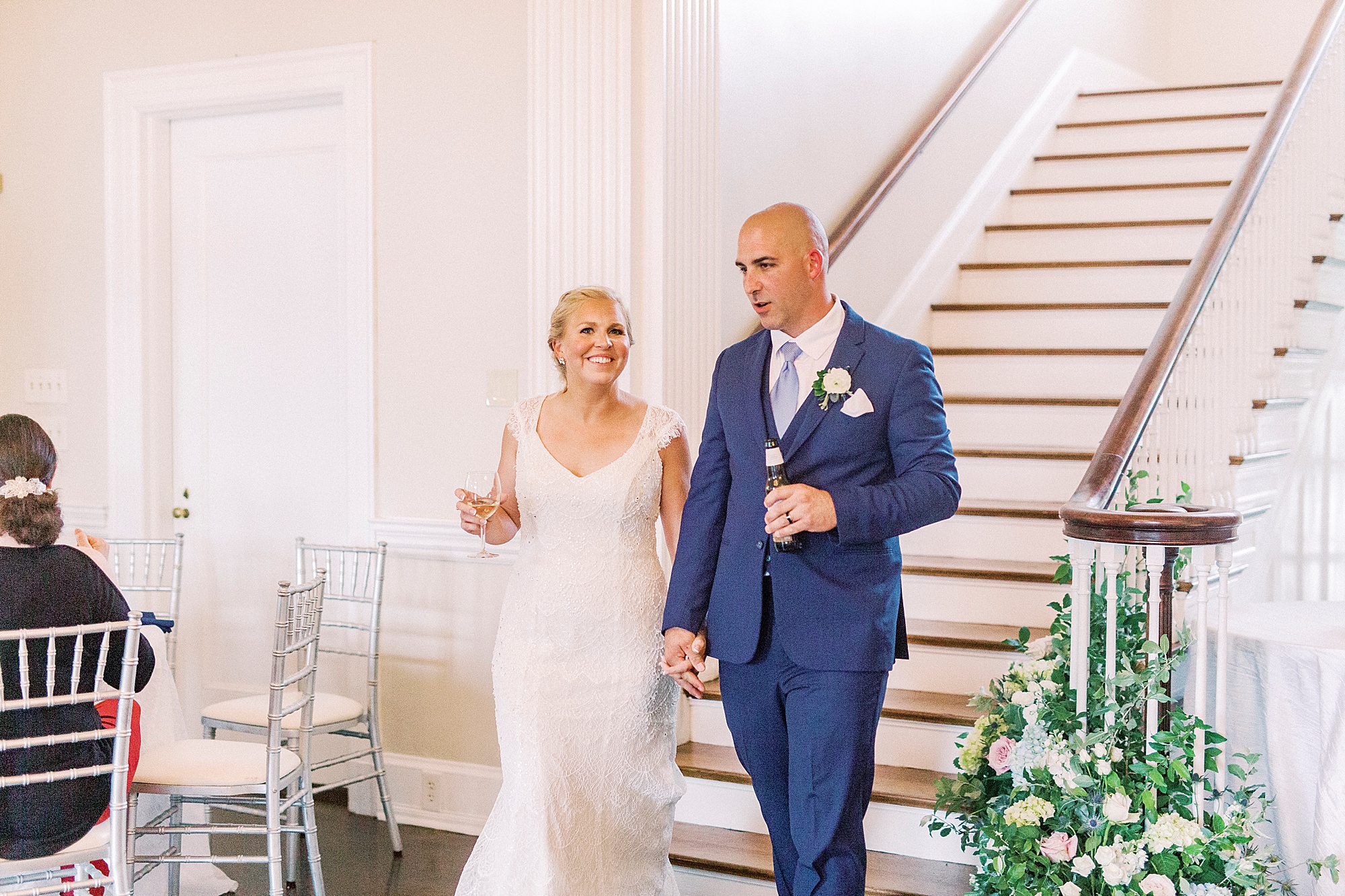 newlyweds walk into wedding reception in Charlotte NC