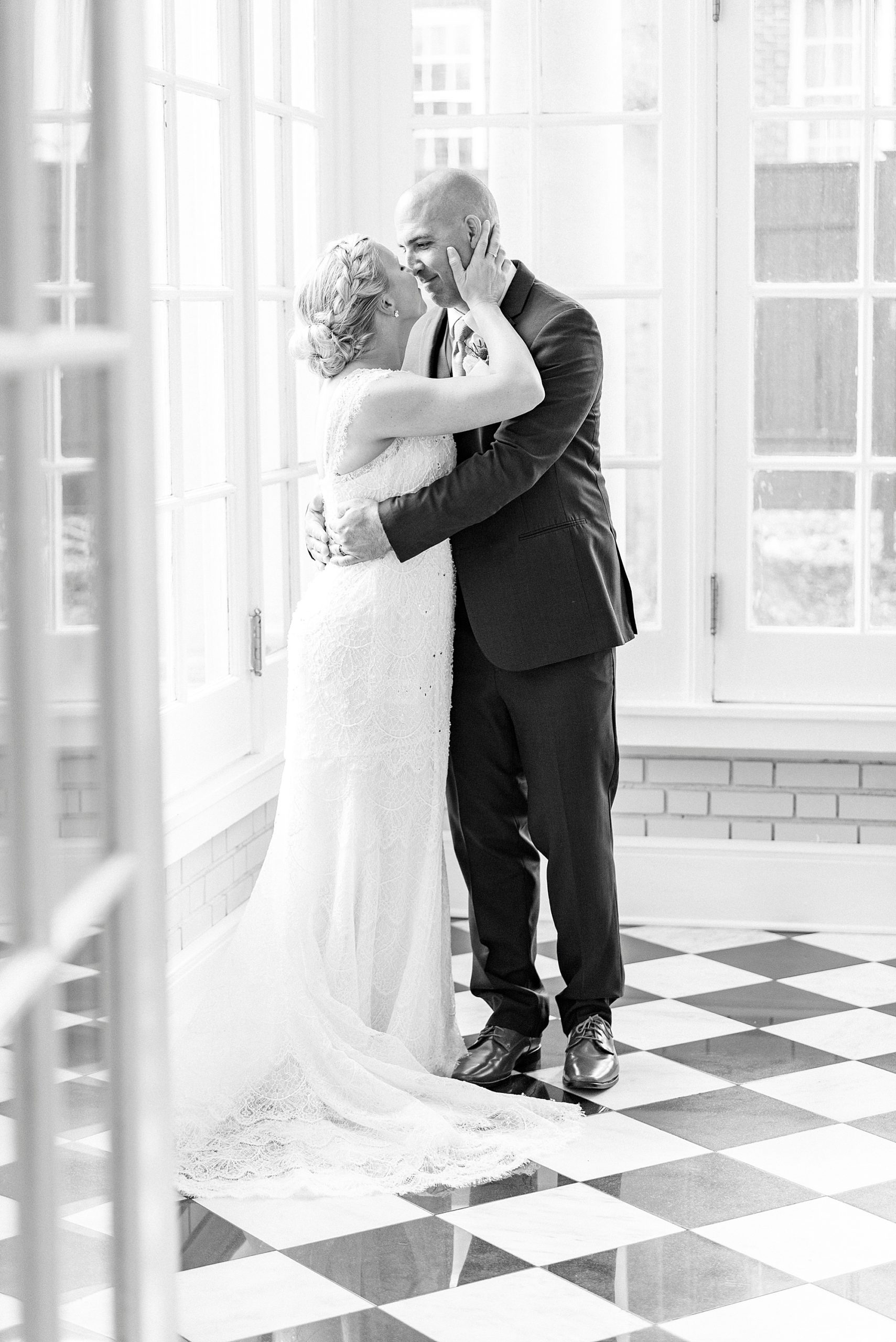 bride and groom kiss inside Separk Mansion