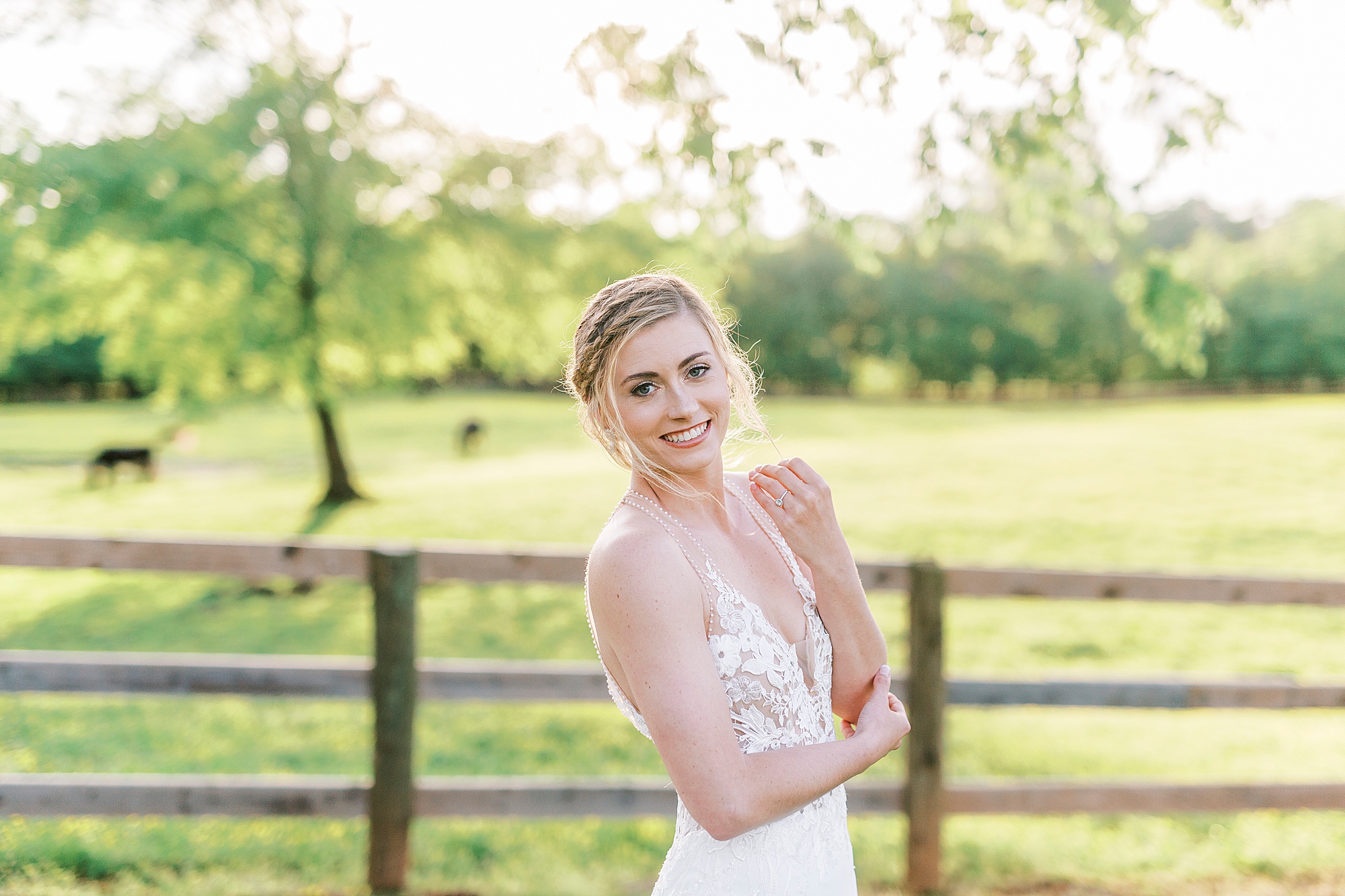 bride leans back with hand next to chin