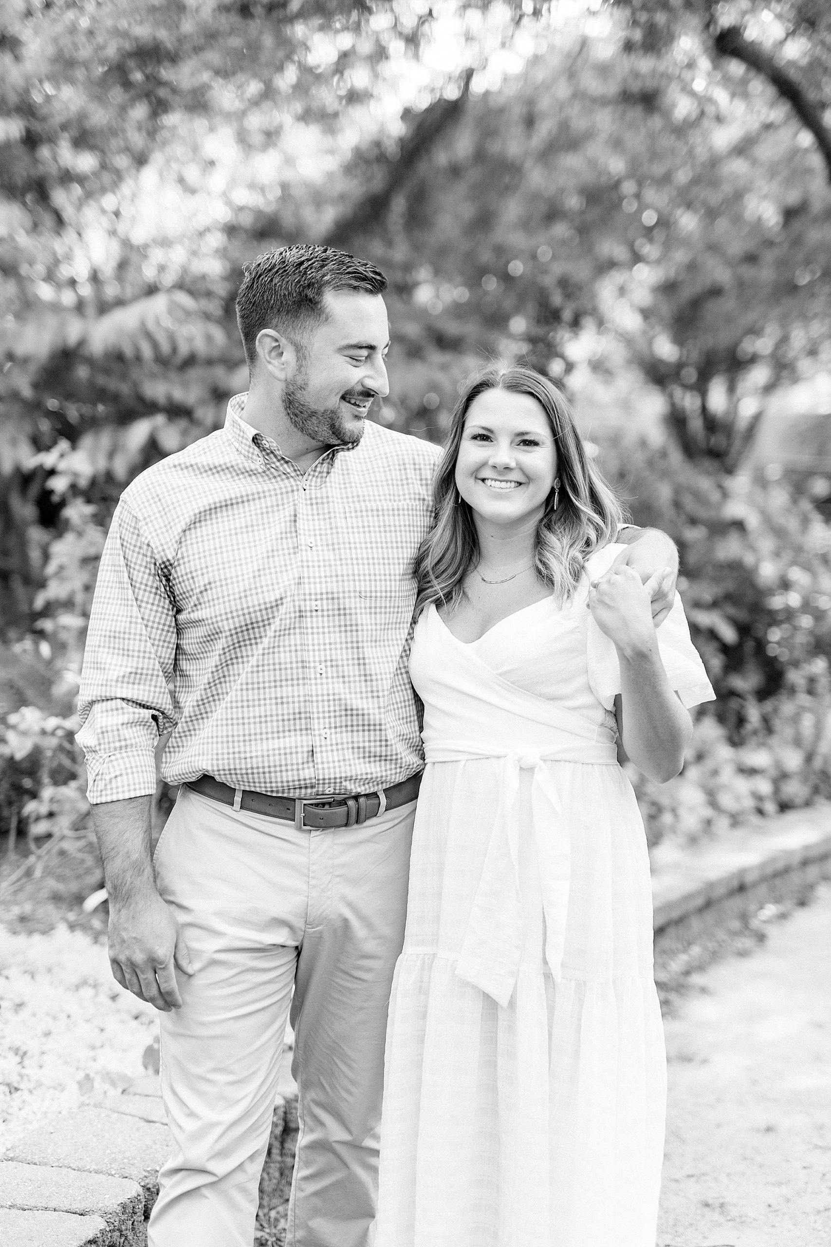 couple walks through McGill Rose Garden