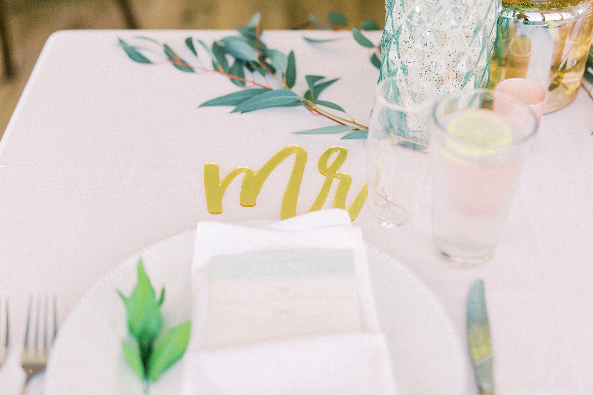 gold "mr" place setting for Oceanic Restaurant wedding