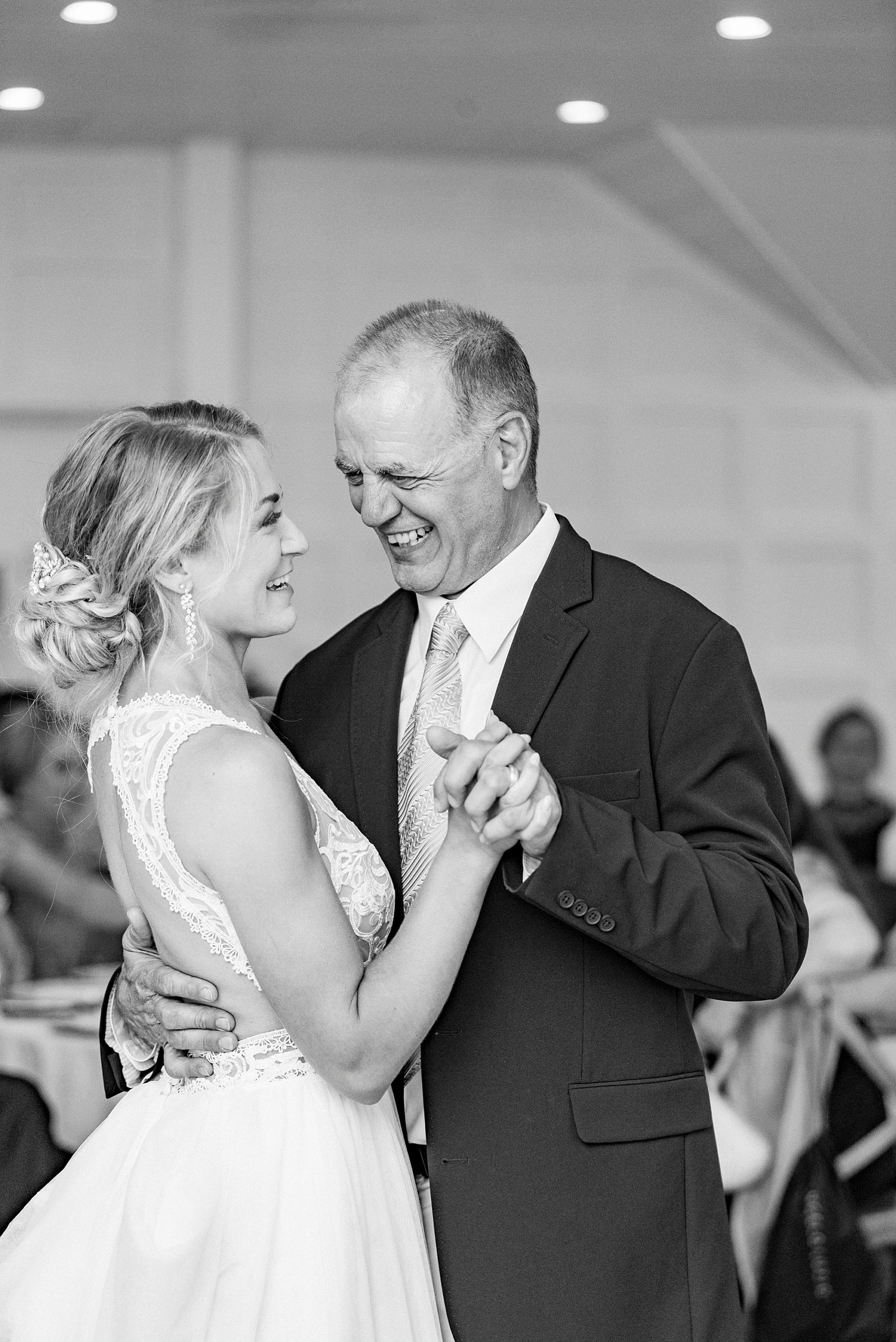 bride dances with dad during Oceanic Restaurant reception