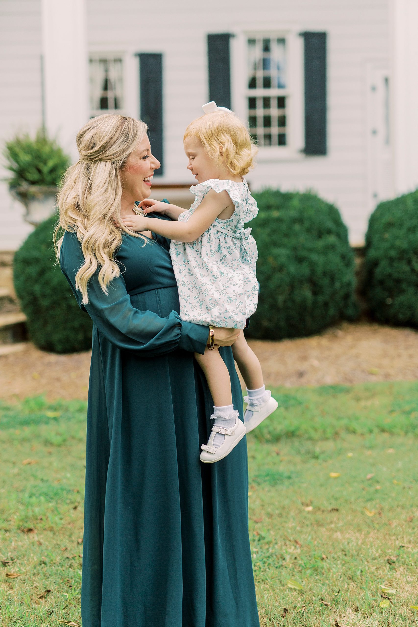 daughter and mom play during NC family session
