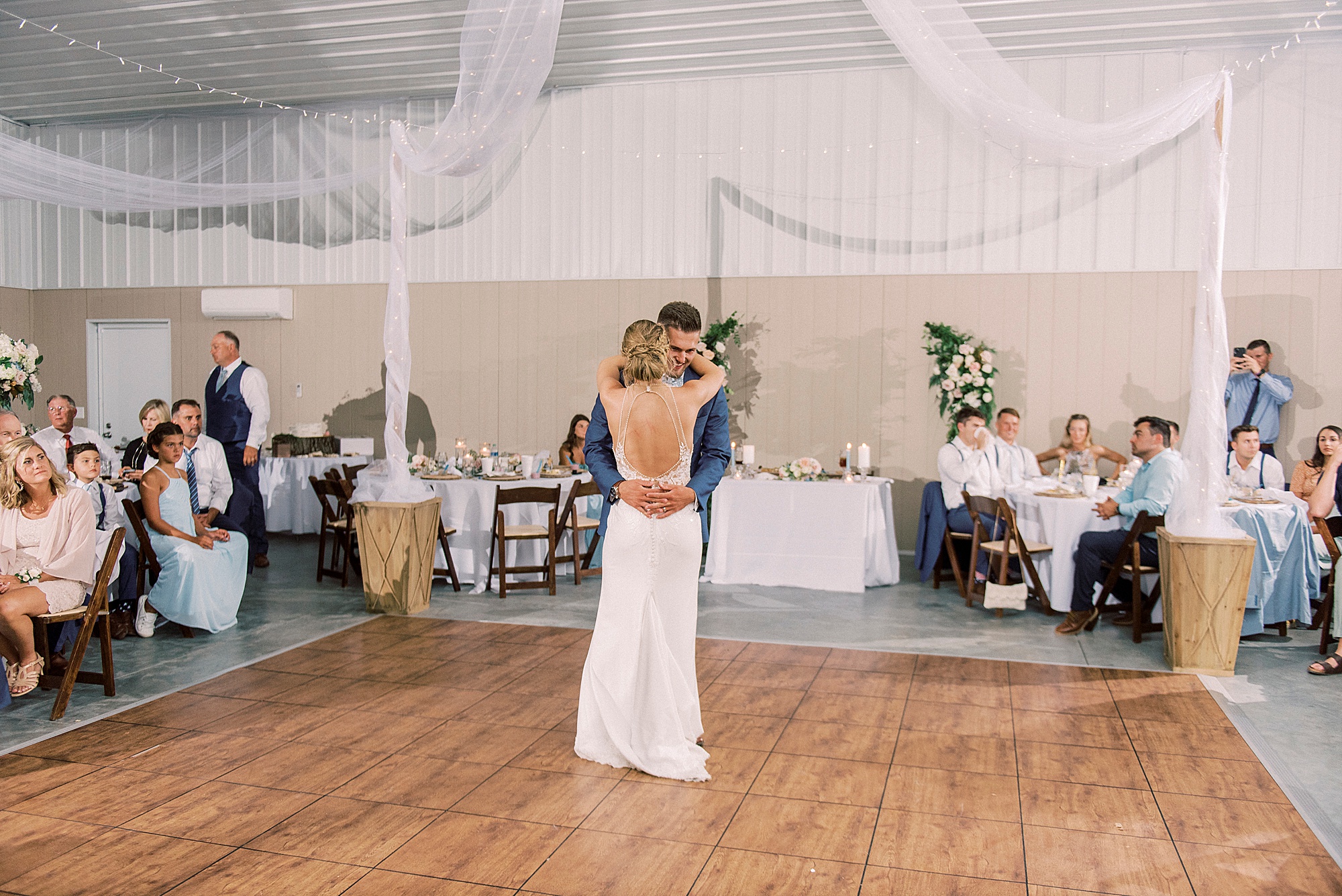 bride and groom have first dance
