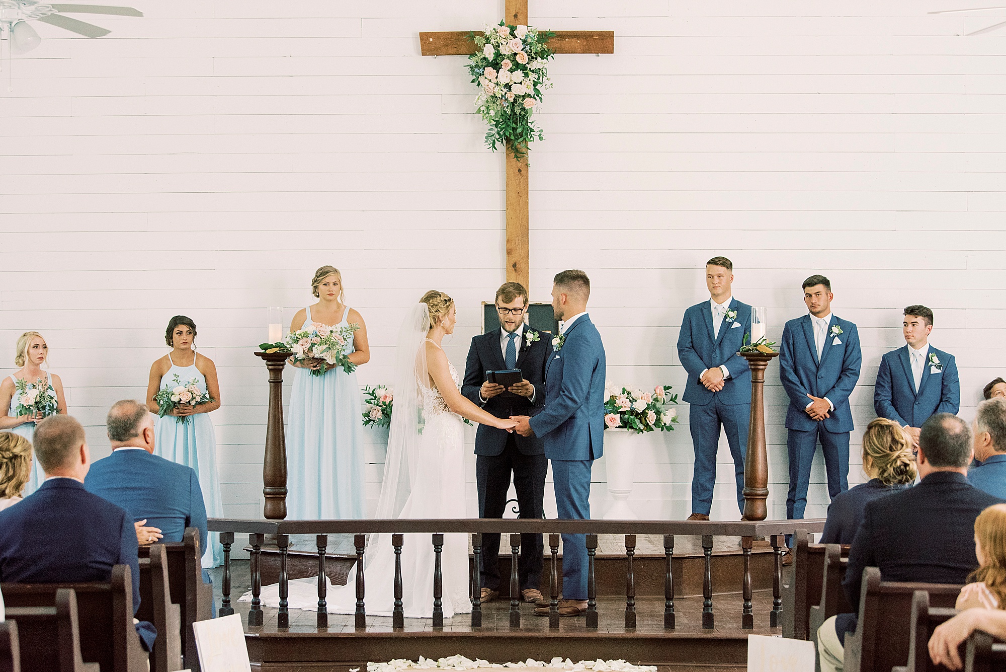 newlyweds exchange vows during traditional church wedding in Winston-Salem NC