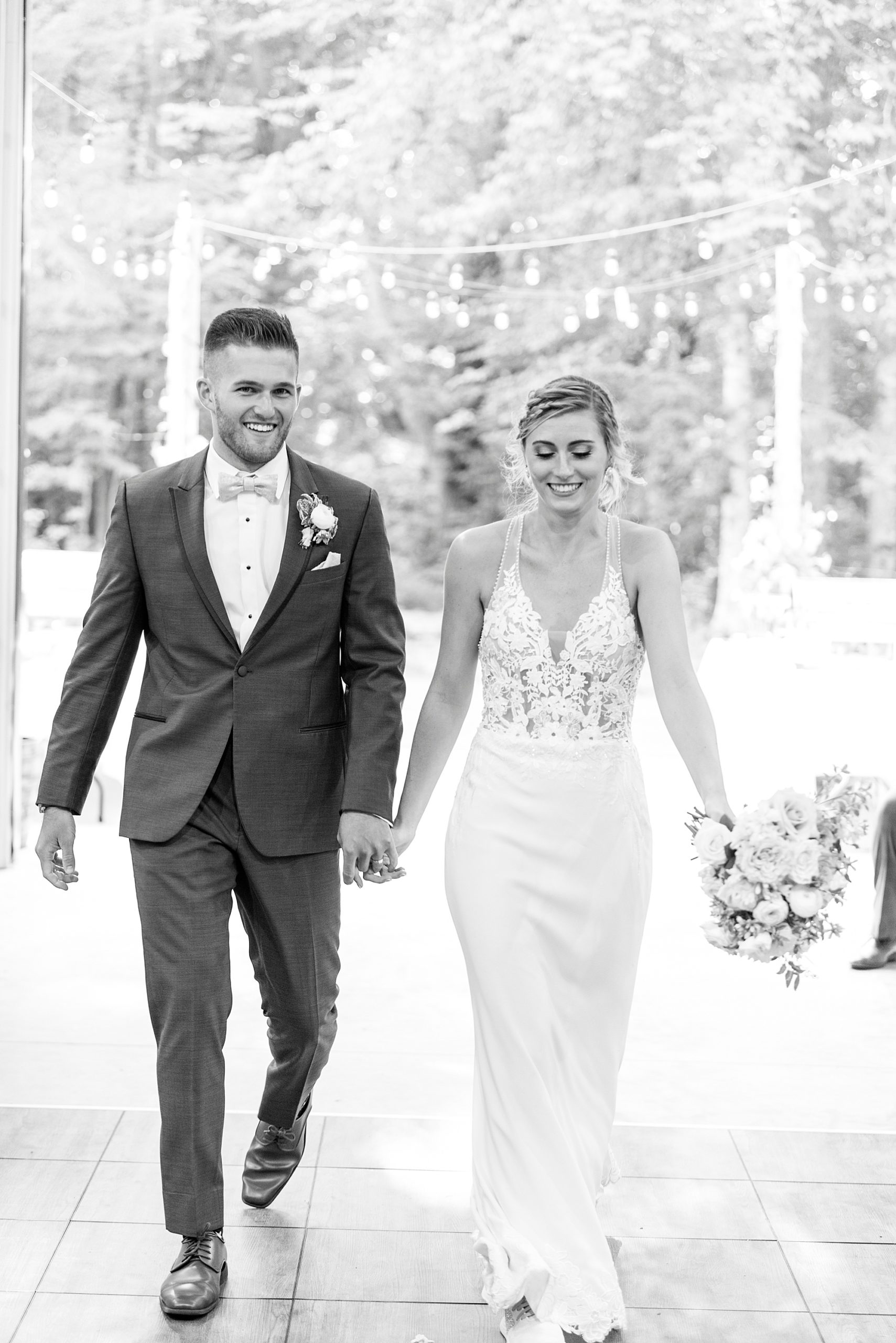 newlyweds walk into wedding ceremony