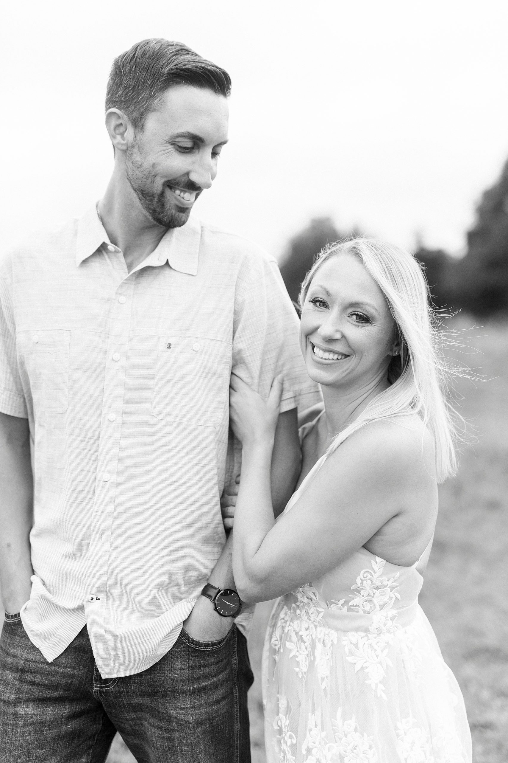 bride and groom hug during fall Hodges Family Farm engagement session