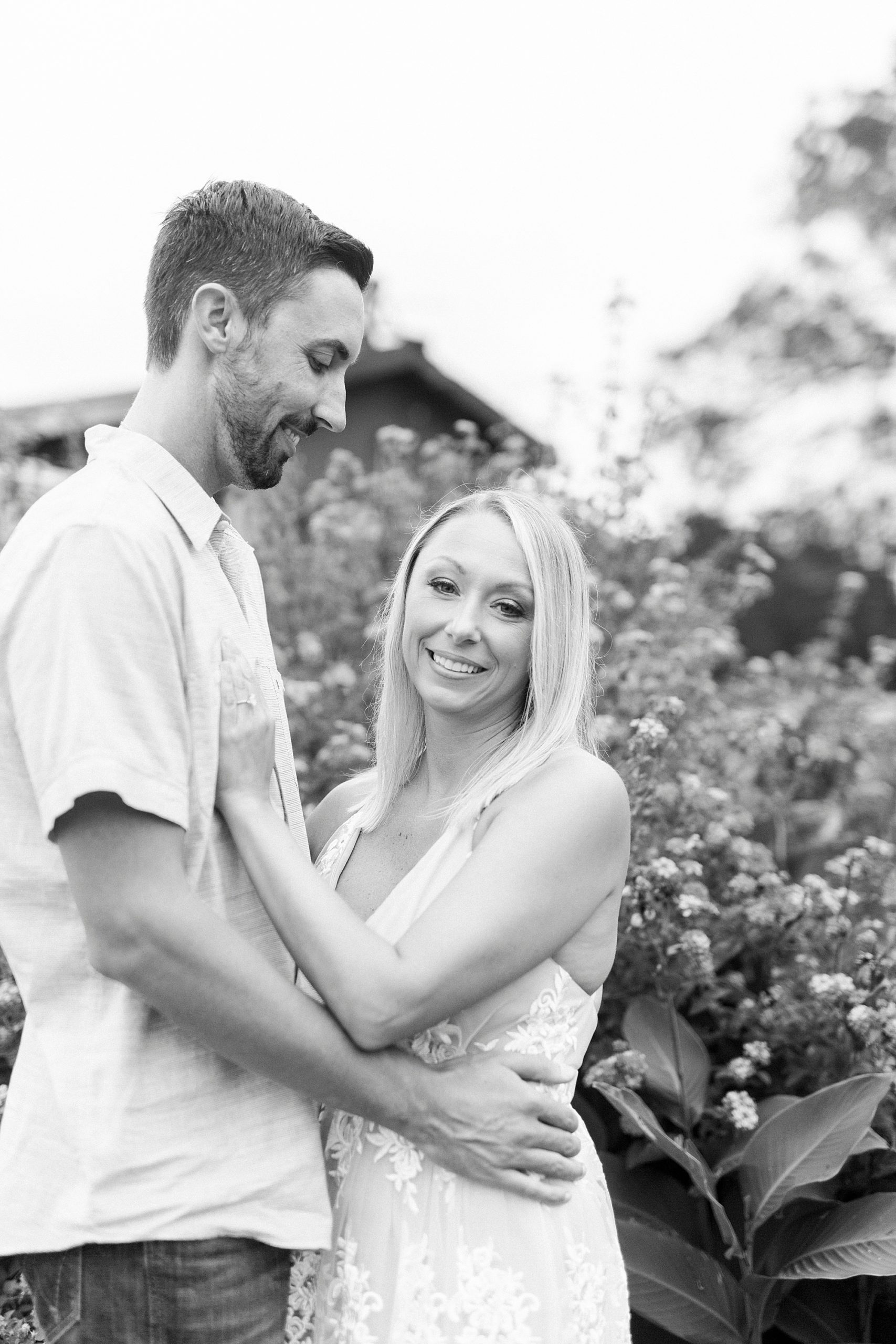groom looks at bride during Hodges Family Farm engagement session