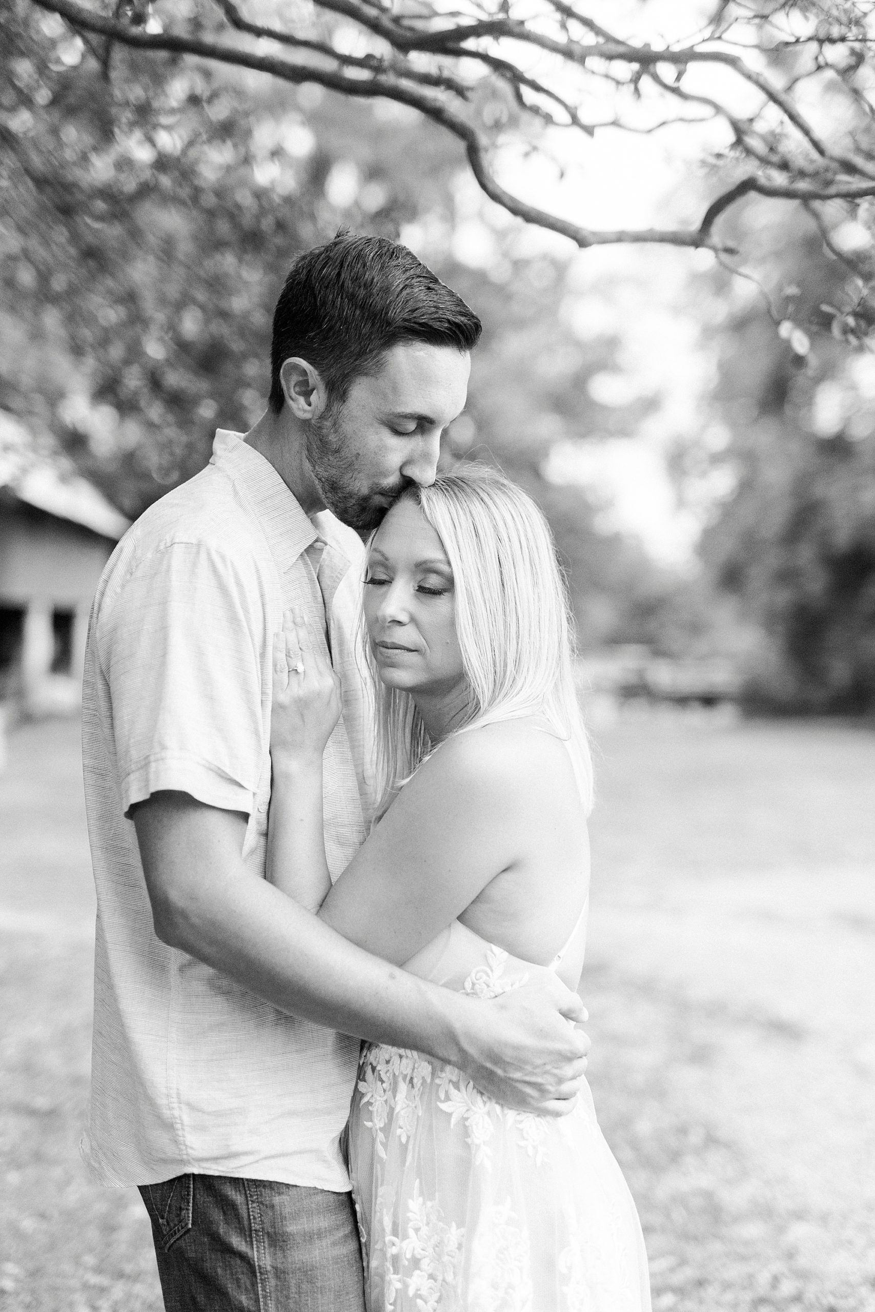 bride and groom hold hands during Charlotte NC engagement photos