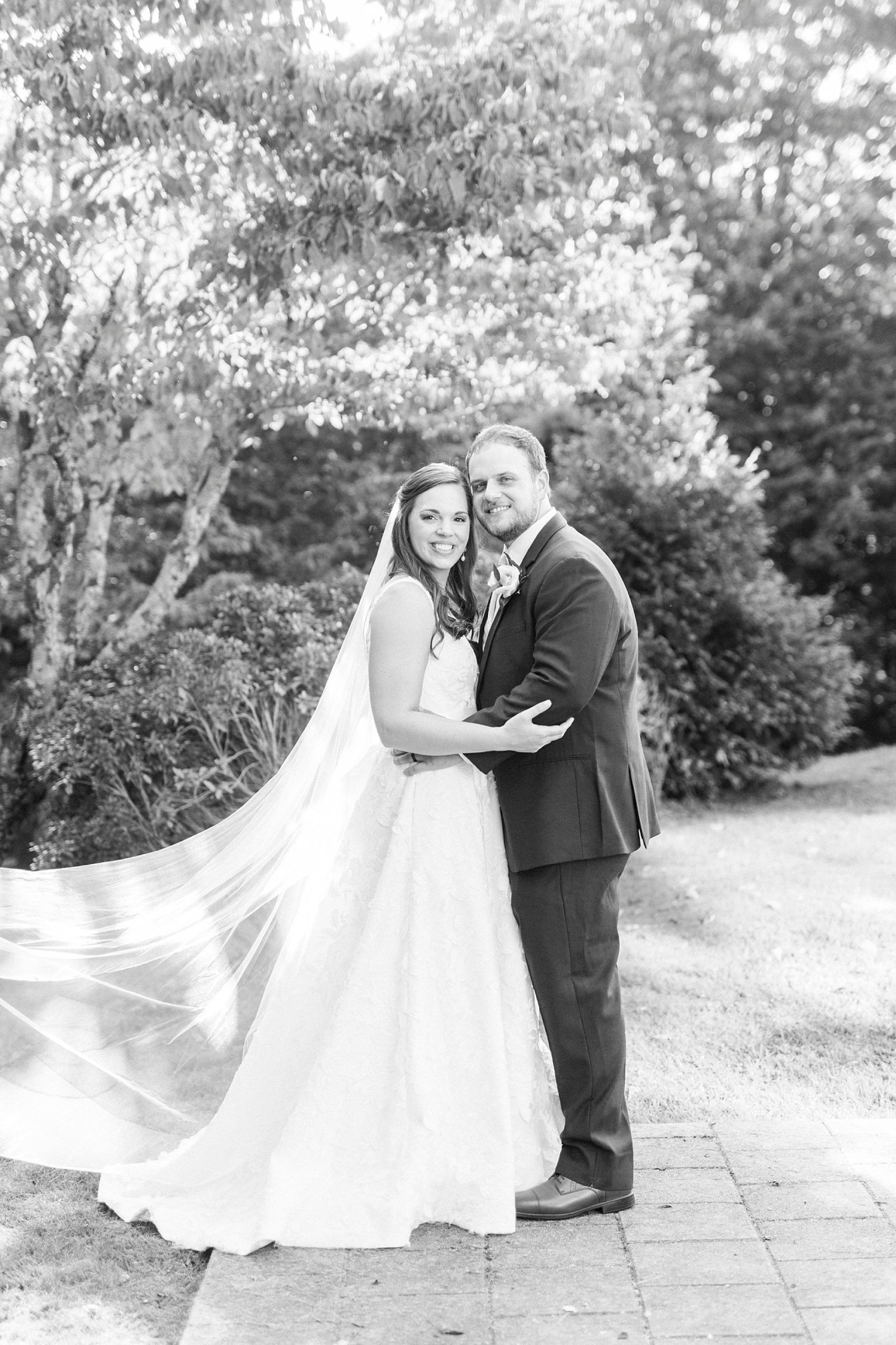 bride and groom hug at The Inn at Crestwood