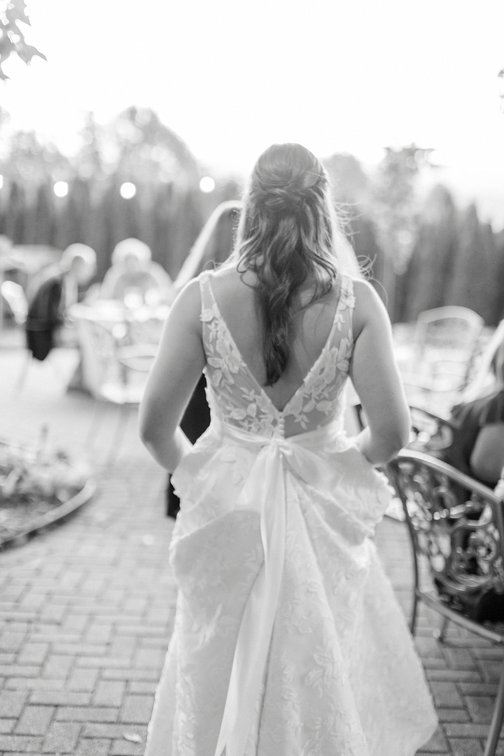 bride walks into cocktail hour at Blowing Rock NC wedding reception