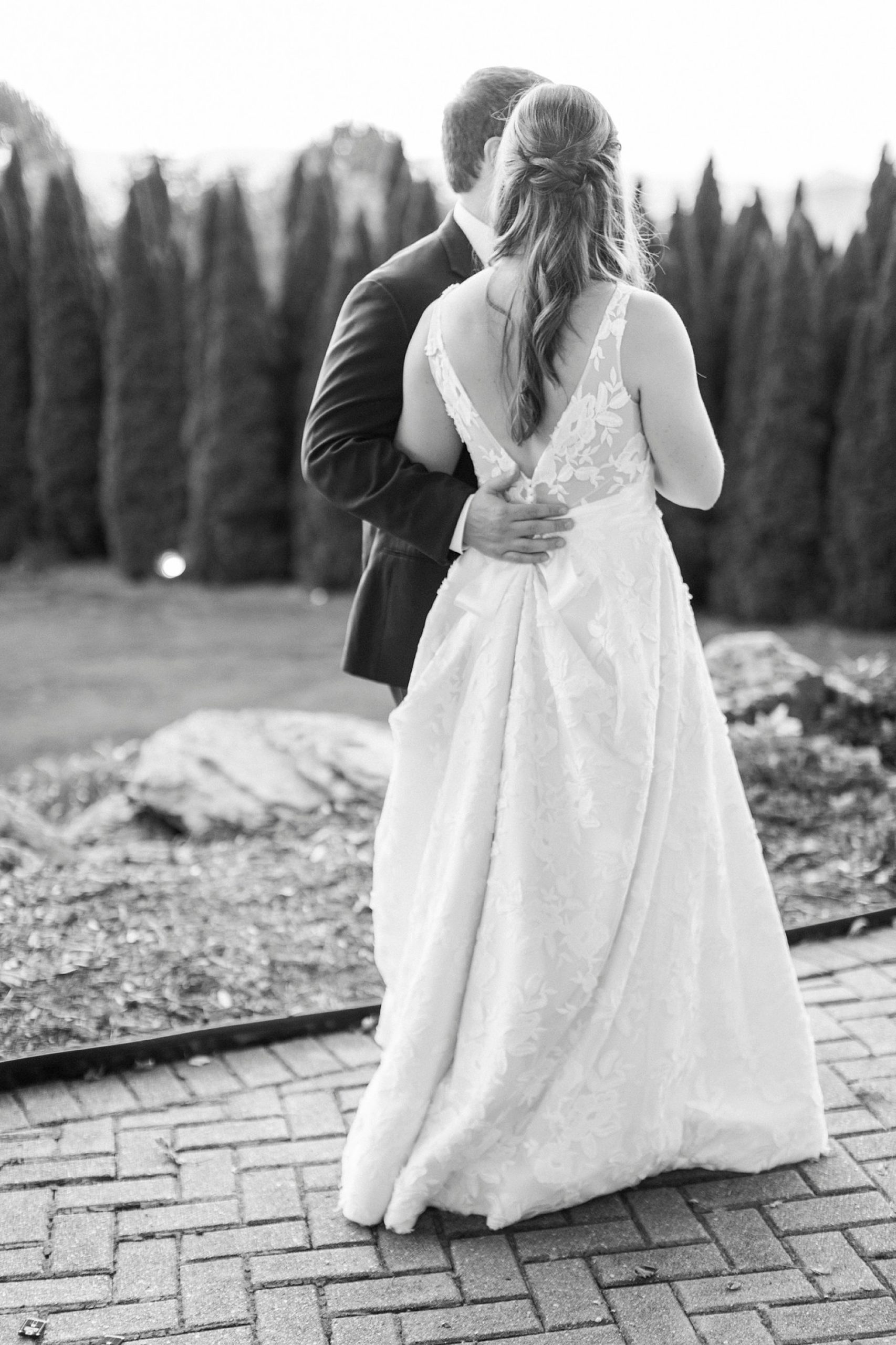 bride and groom dance on edge of cocktail hour during Blowing Rock NC wedding reception