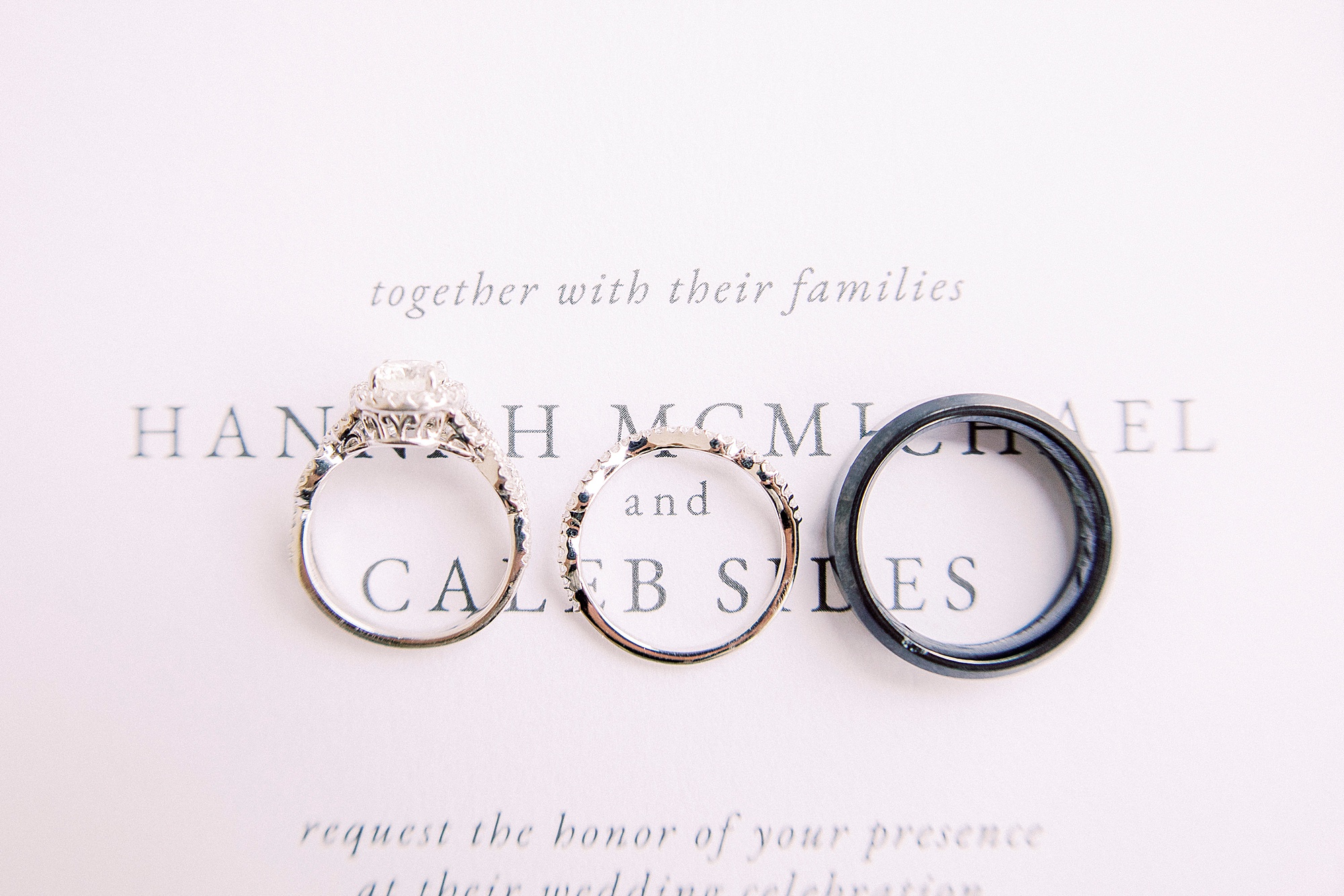 wedding rings on invitation suite at Greensboro NC