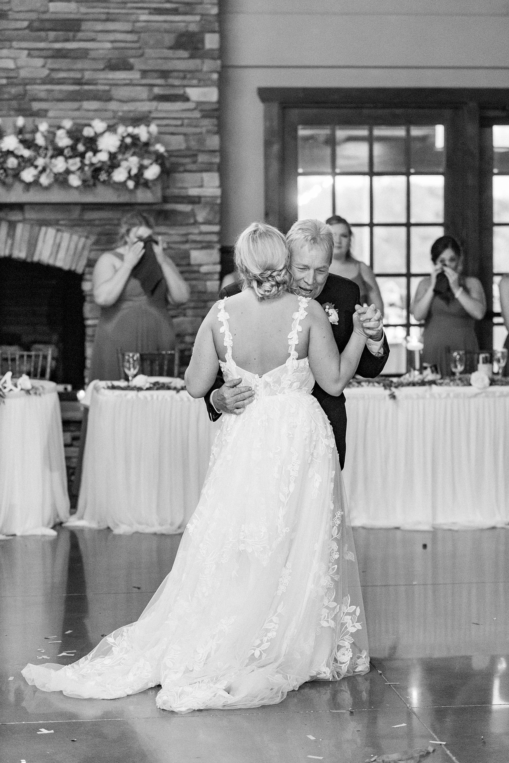 bride and grandfather dance during Greensboro NC wedding reception