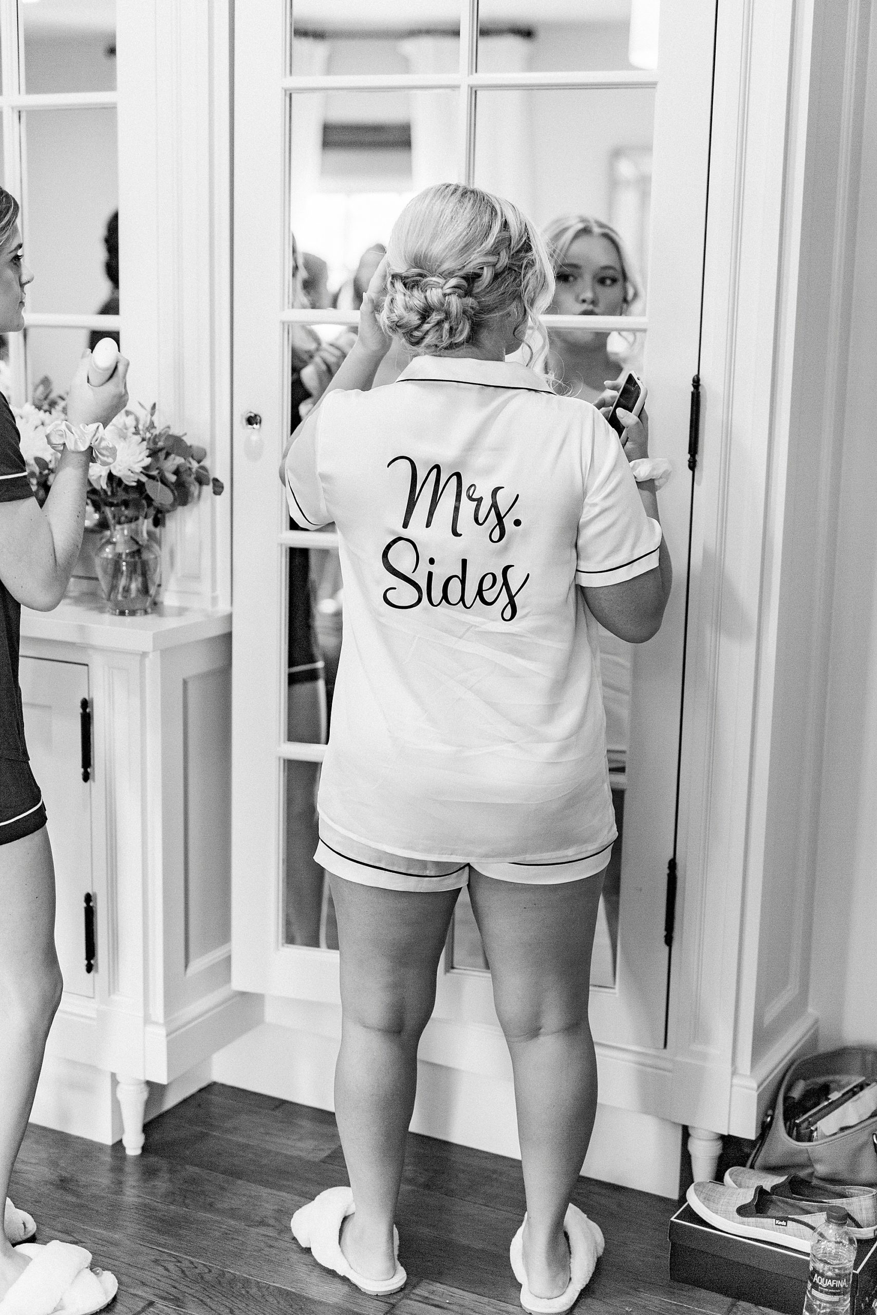 bride poses in custom robe
