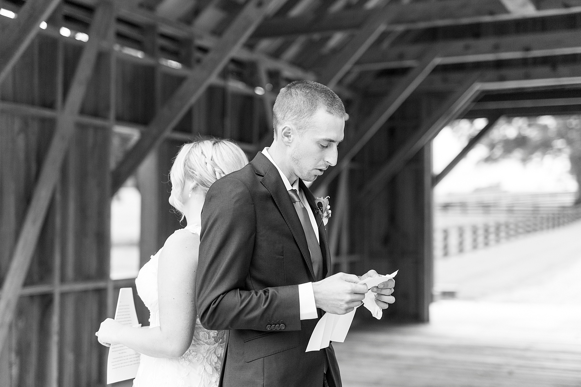 couple reads vows back to back on wedding day