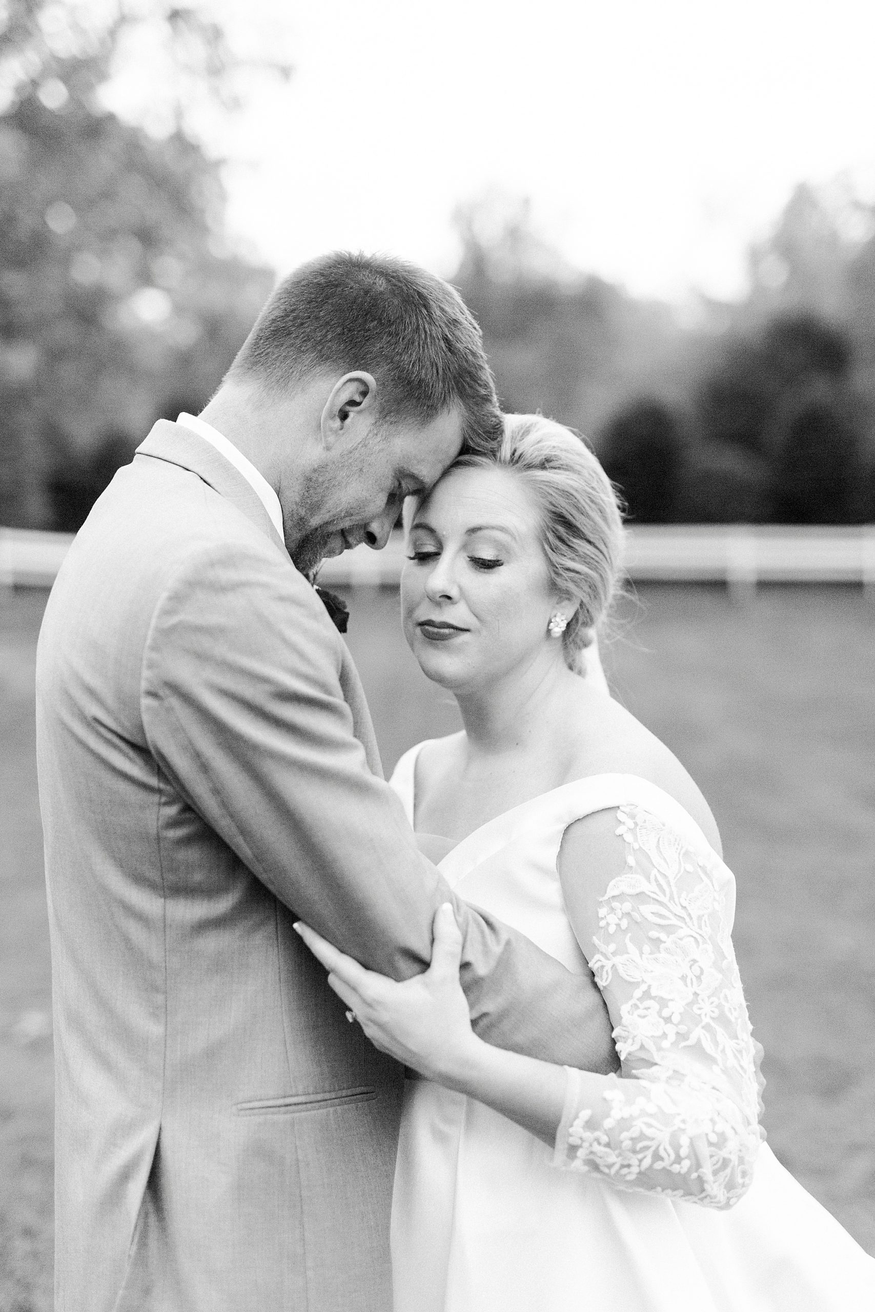 bride and groom lean into each other at Vesuvius Vineyards