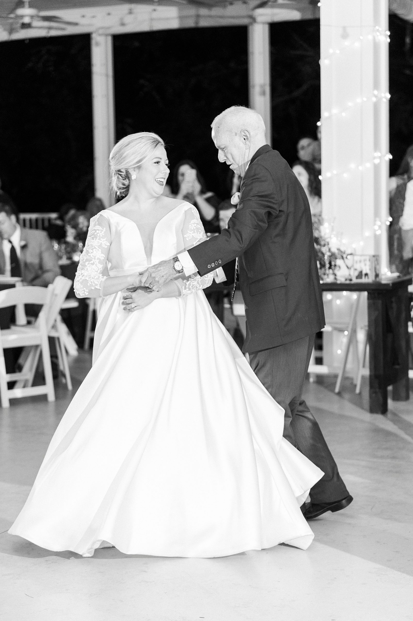 bride and dad dance during NC wedding reception