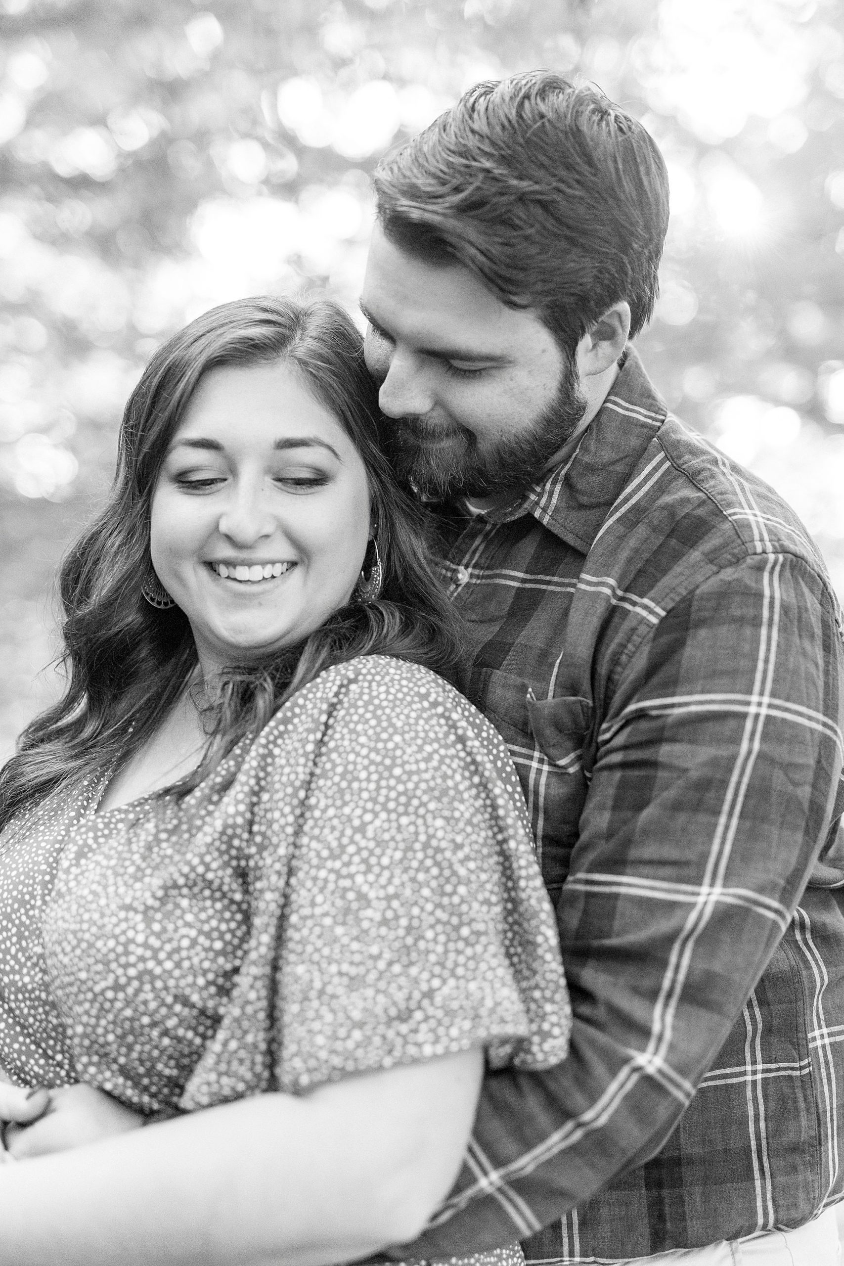 engaged couple hugs during NC engagement portraits