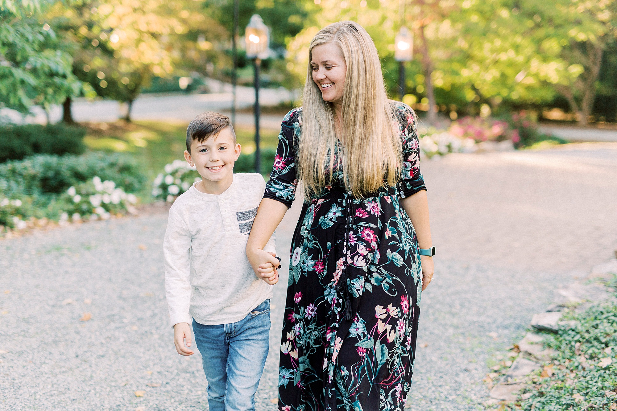 mom and son walk outside Concord NC home