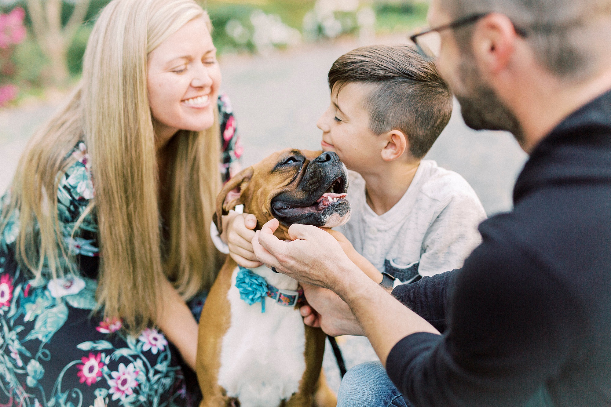 puppy licks boy during Ritchie Hill family photos