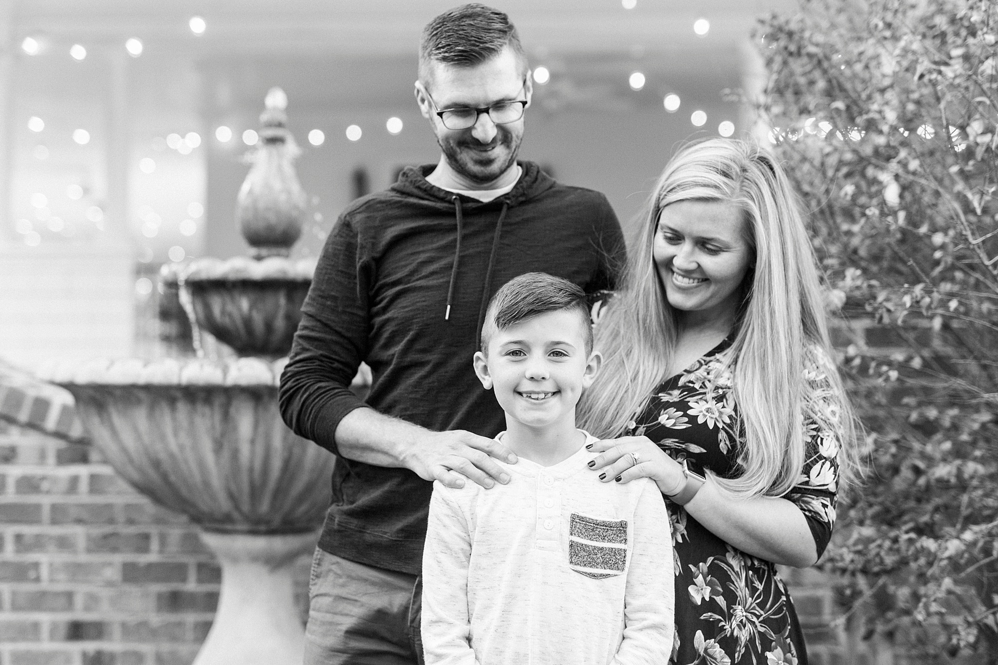 parents hug son during Ritchie Hill family portraits