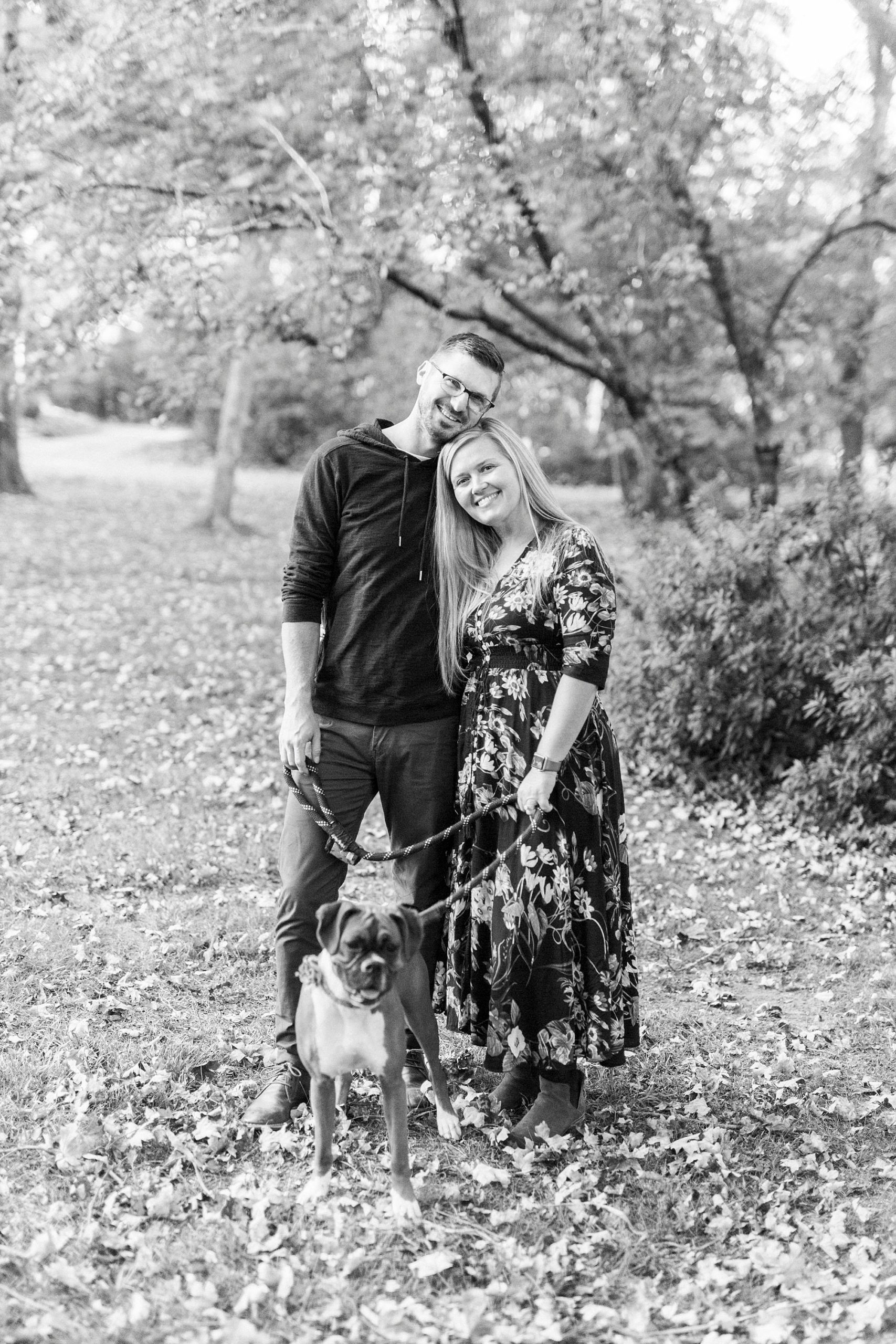 couple poses with puppy at Ritchie Hill
