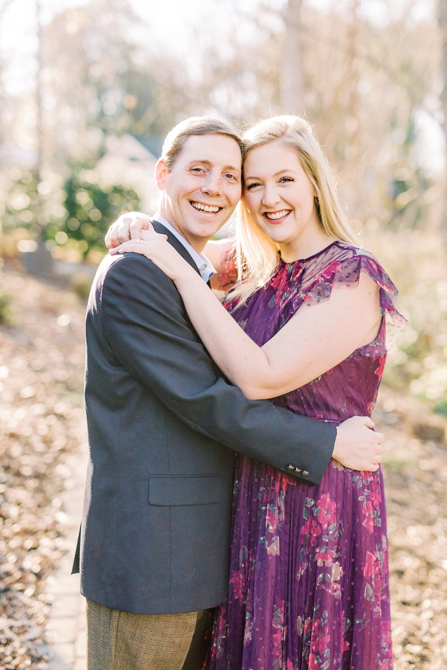bride and groom hug together during NC engagement session