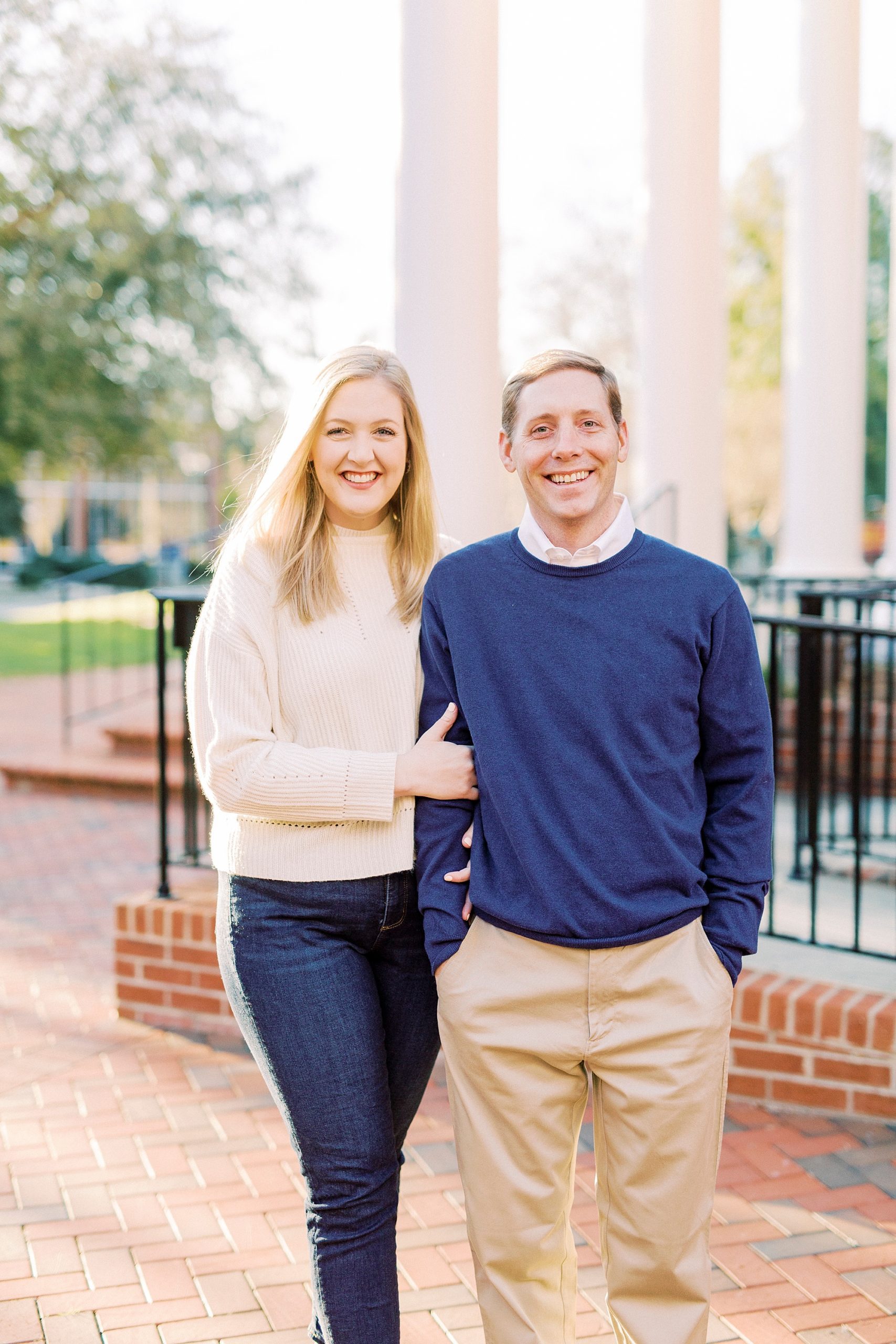 engaged couple walks through Downtown Concord