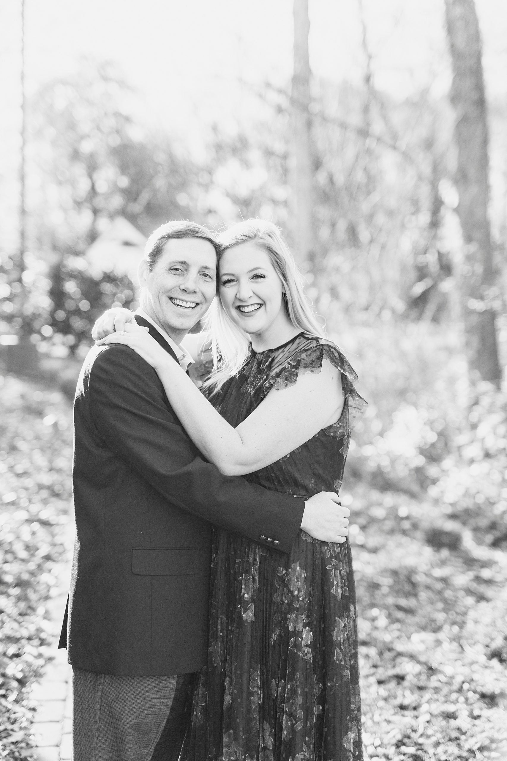 engaged couple leans heads together during NC photos at Ritchie Hill