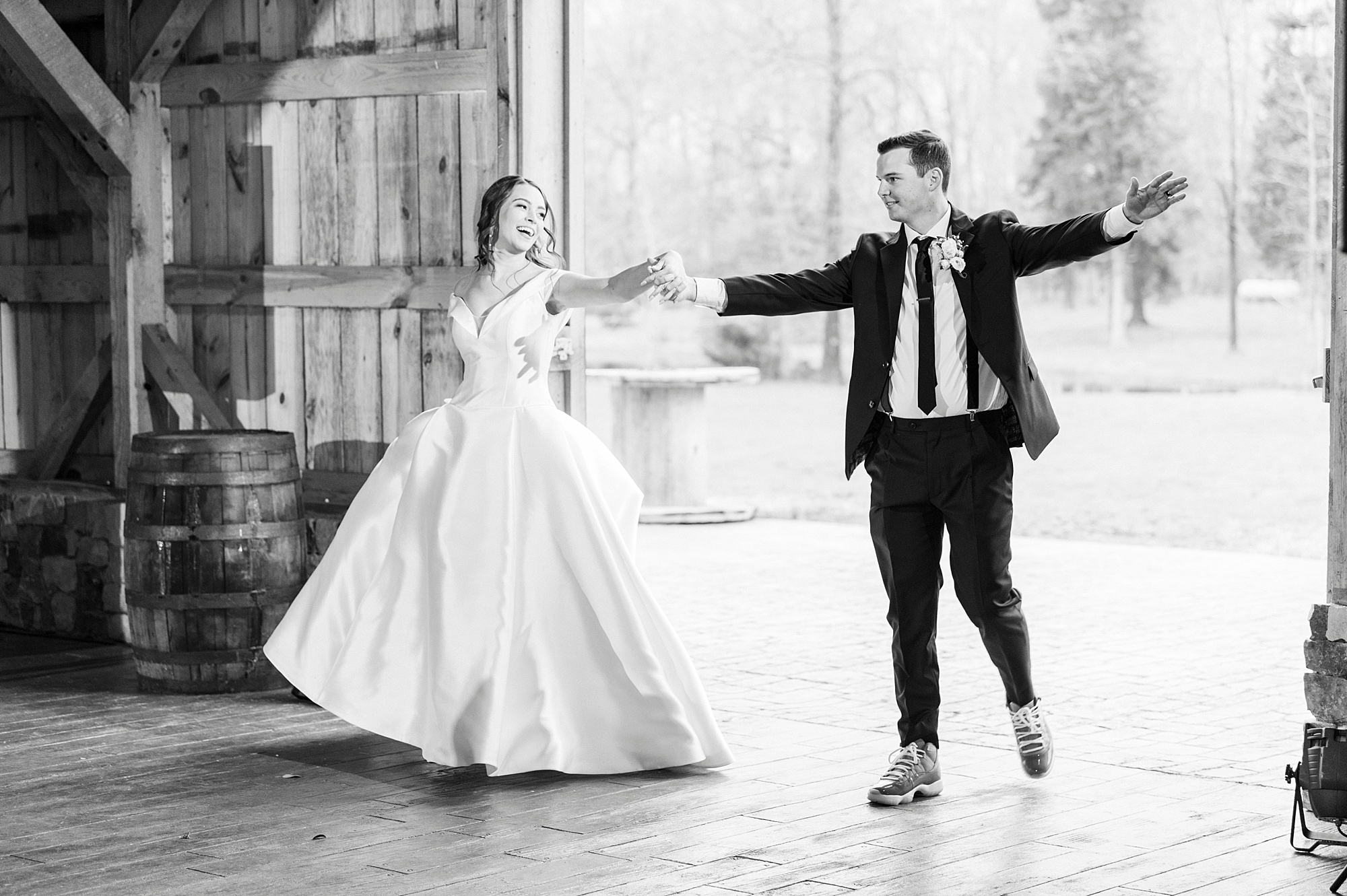 newlyweds walk into wedding reception at The Farm at Brusharbor
