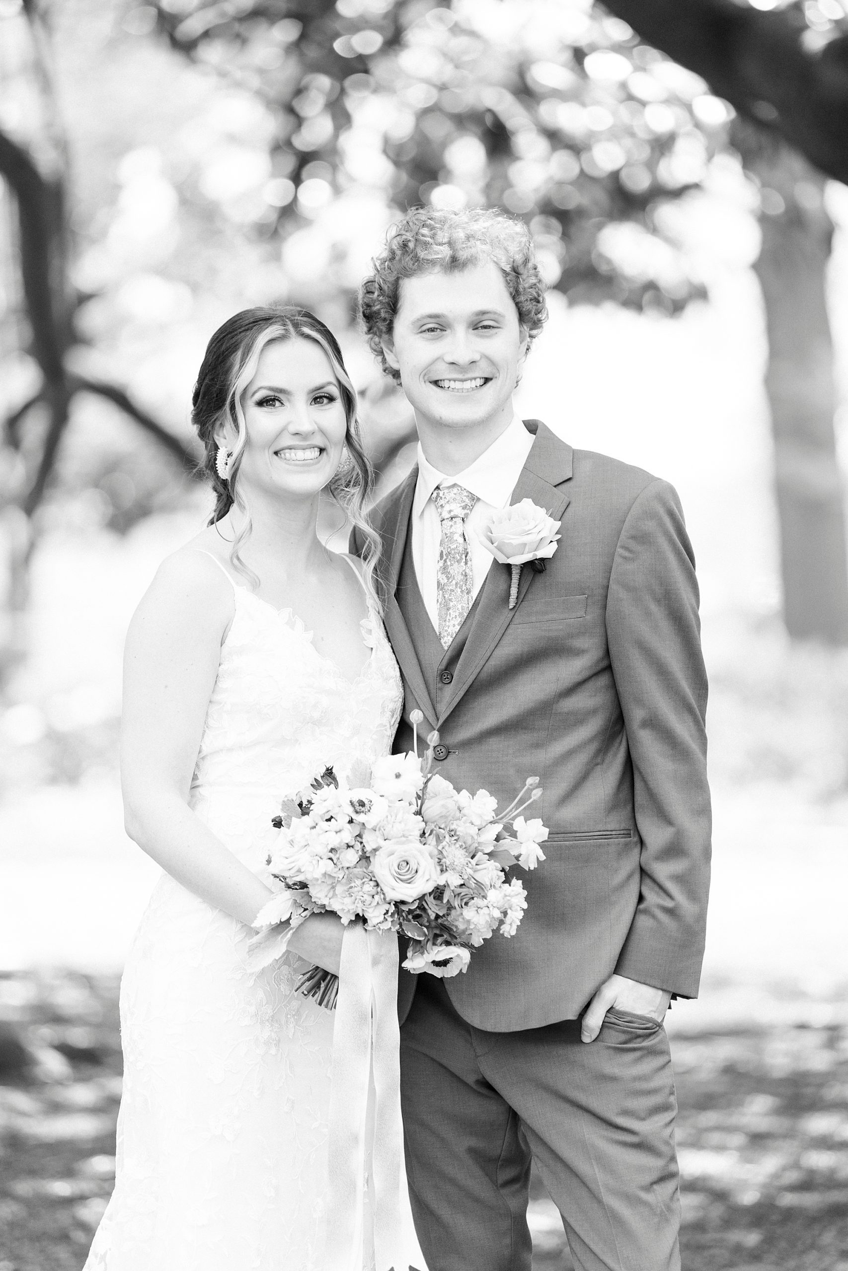 newlyweds pose together in Raleigh NC during first look