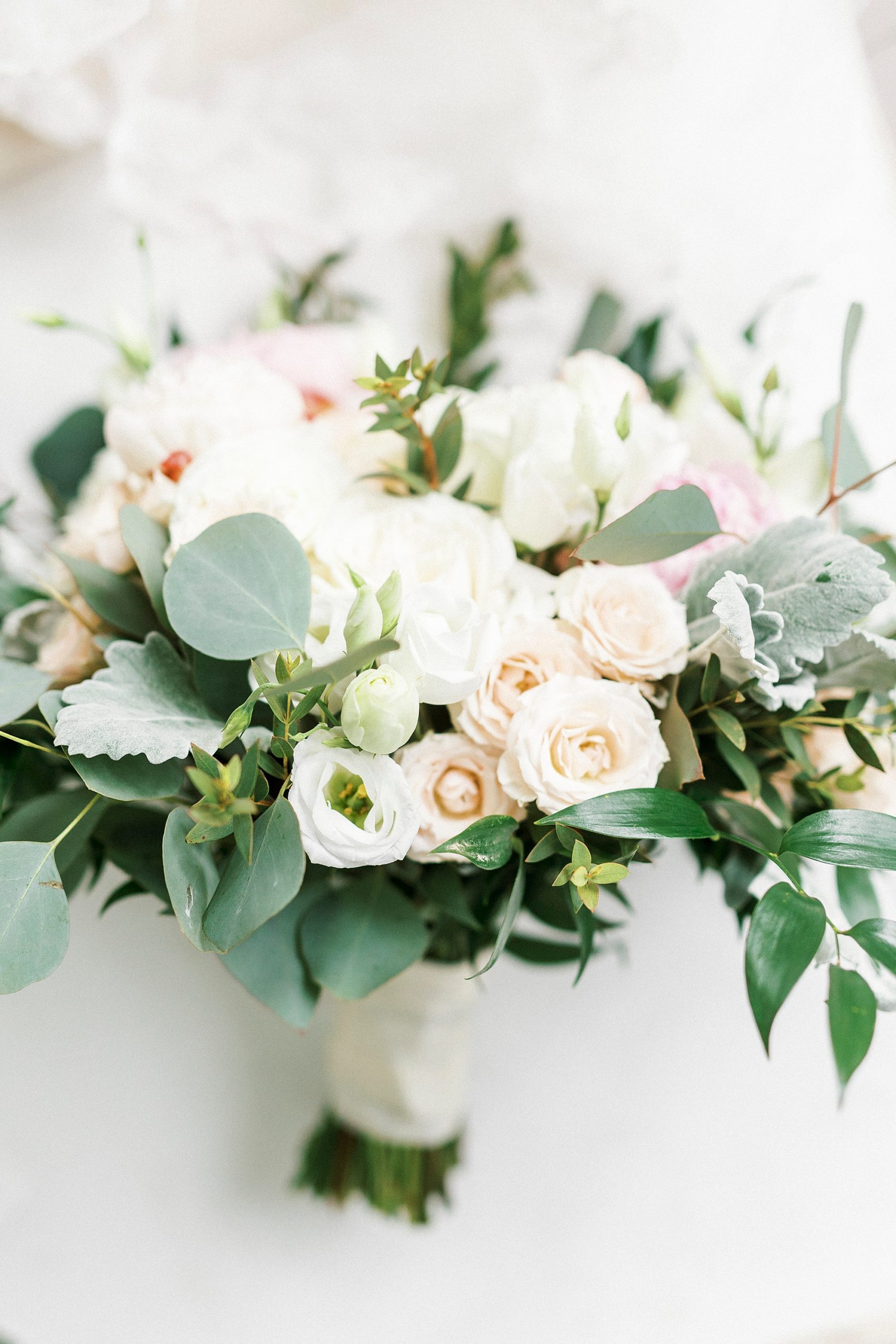 bride's bouquet of white and pale pink flowers