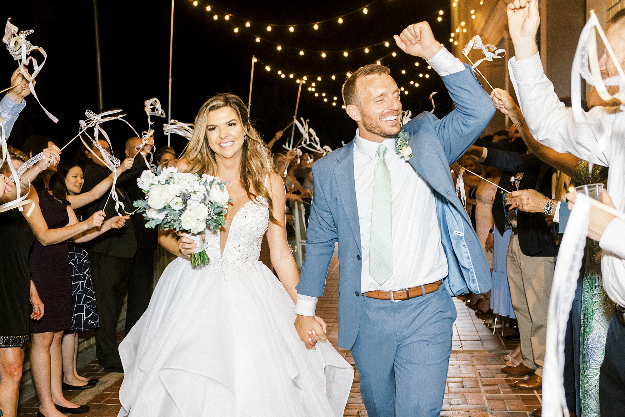 newlyweds cheer leaving wedding reception in Gastonia NC