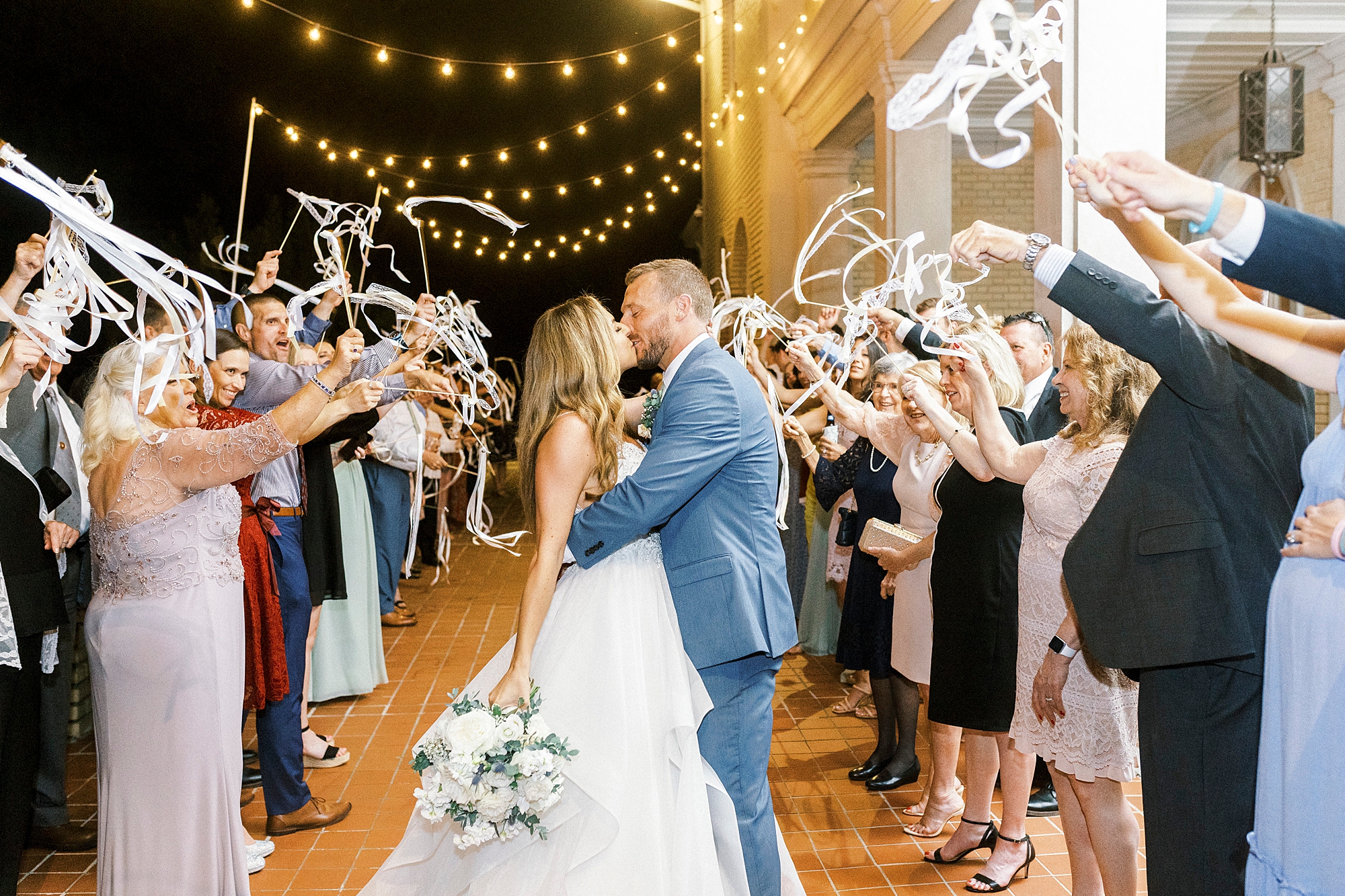 newlyweds kiss during sparkler exit from Separk Mansion