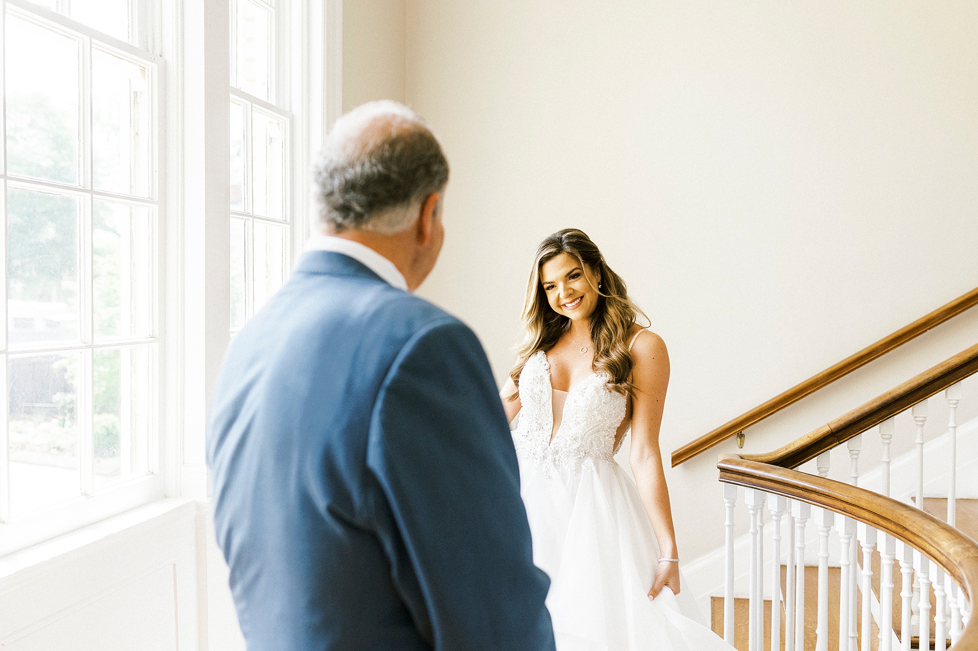 bride has first look with dad before Separk Mansion wedding day